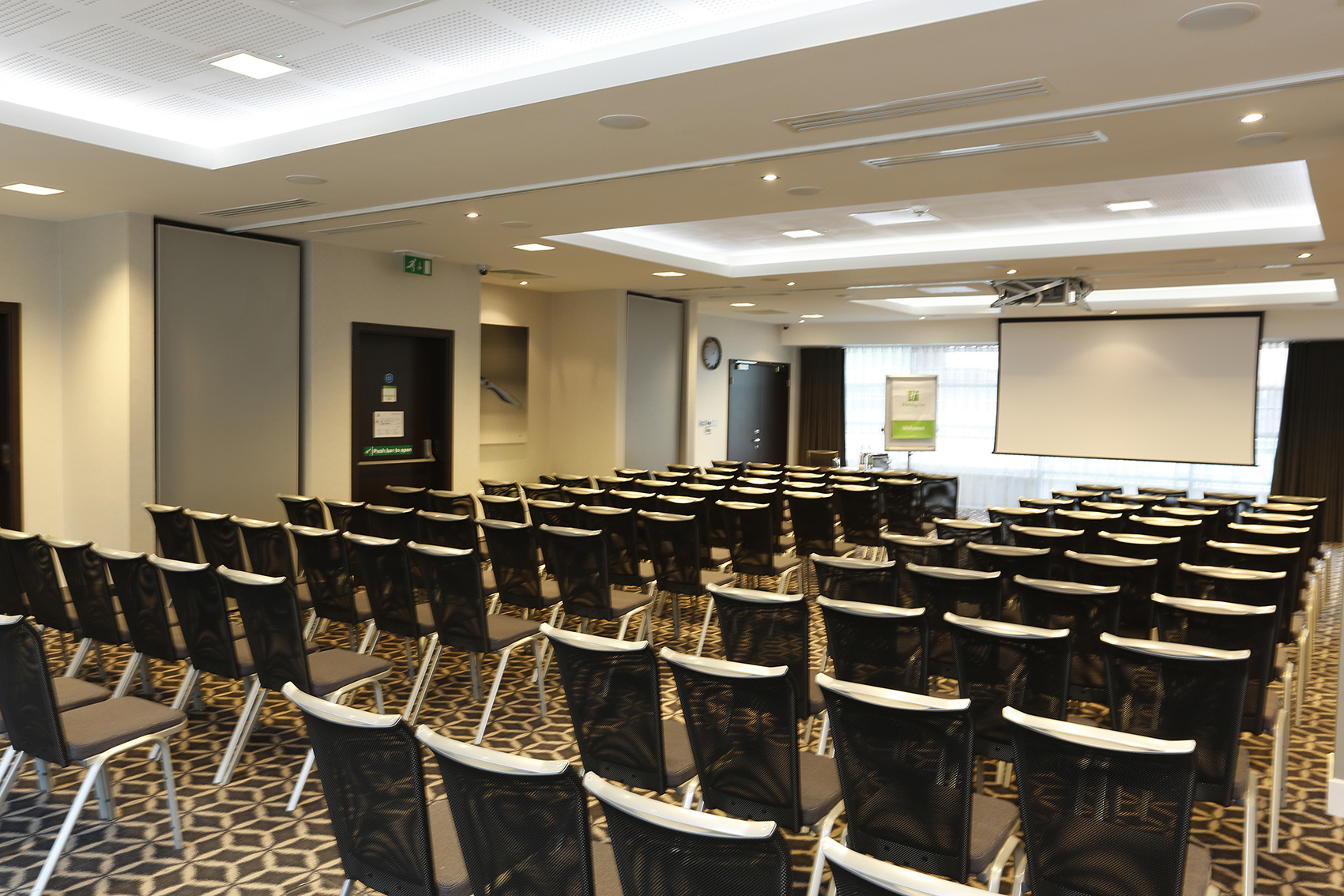 Laker Suite meeting room with black and white chairs, perfect for conferences or workshops.