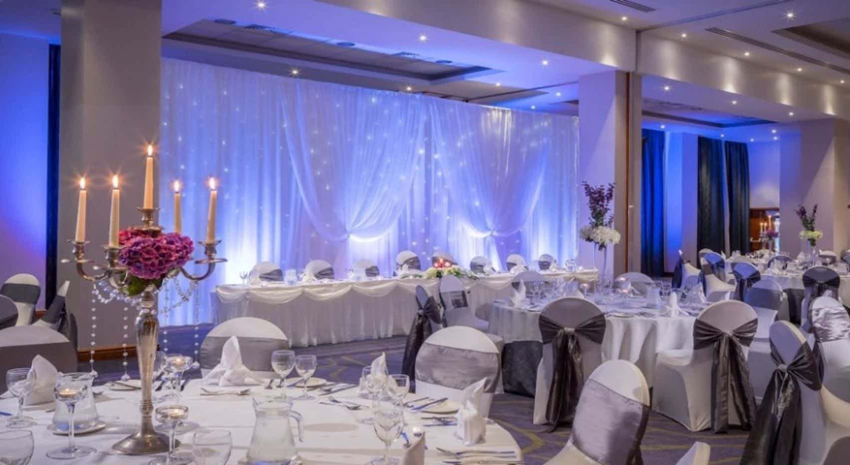 Elegant banquet hall in Clayton Hotel Belfast, perfect for weddings and formal events.