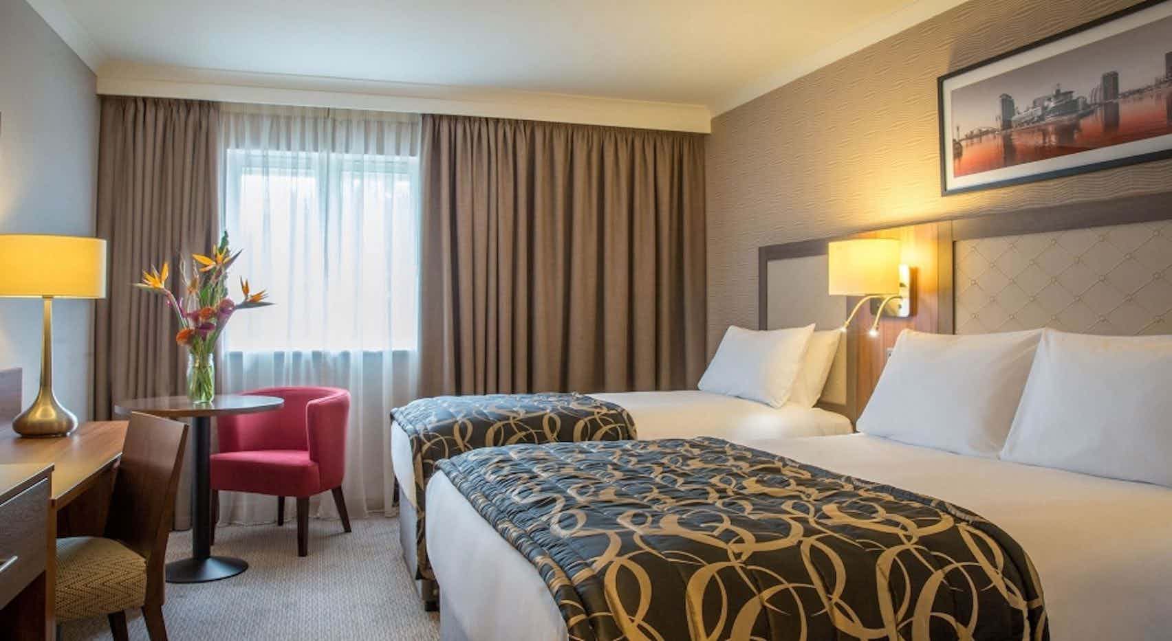 Olympic Suite in Clayton Hotel Belfast with twin beds, ideal for events and meetings.