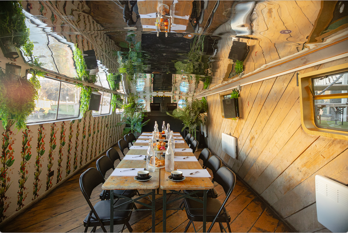 Mary Read Boat event space in Hackney Wick with rustic decor, perfect for private dining or brainstorming.