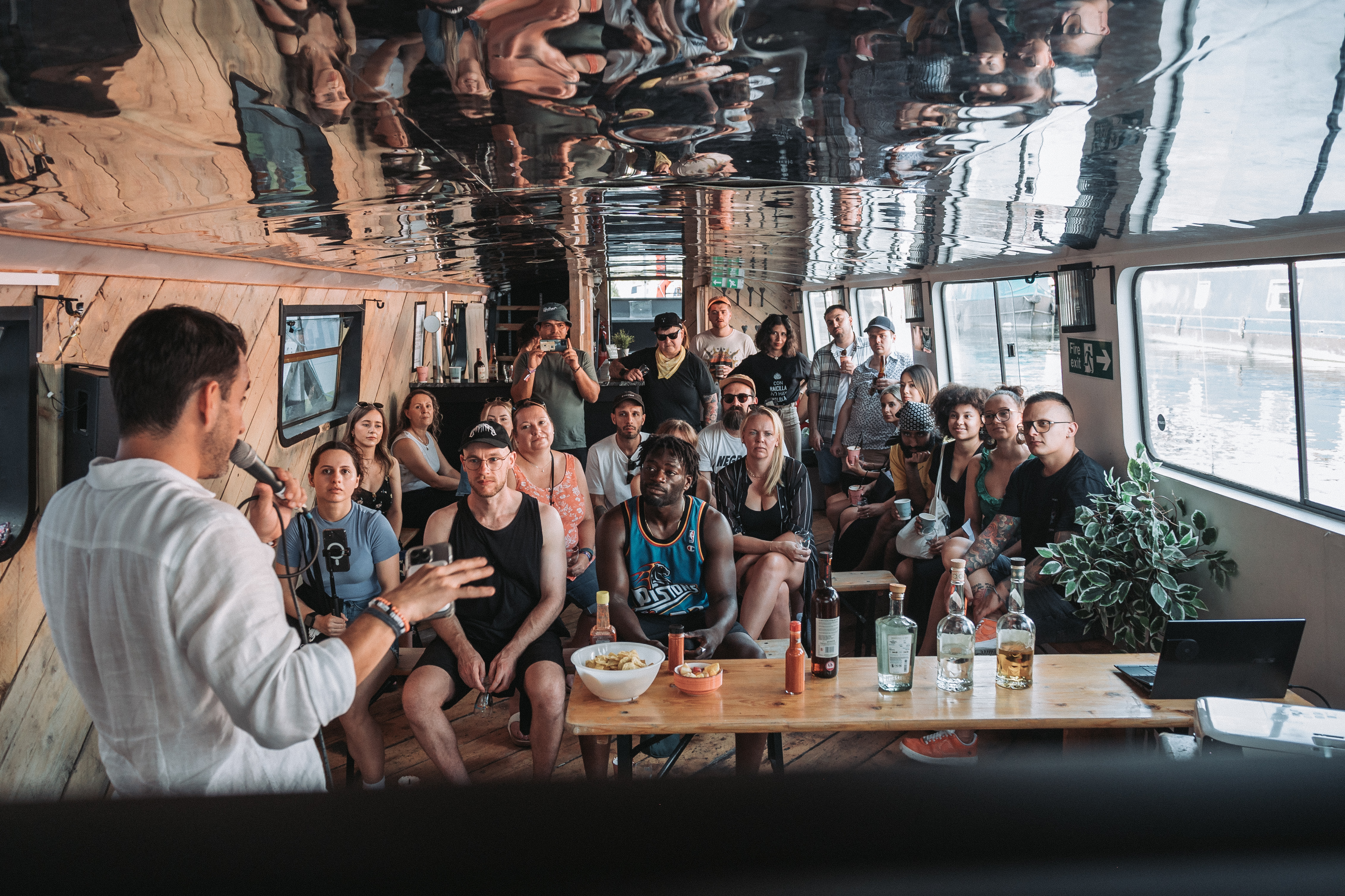 Dynamic group meeting on Mary Read Boat, ideal for team-building and collaboration.