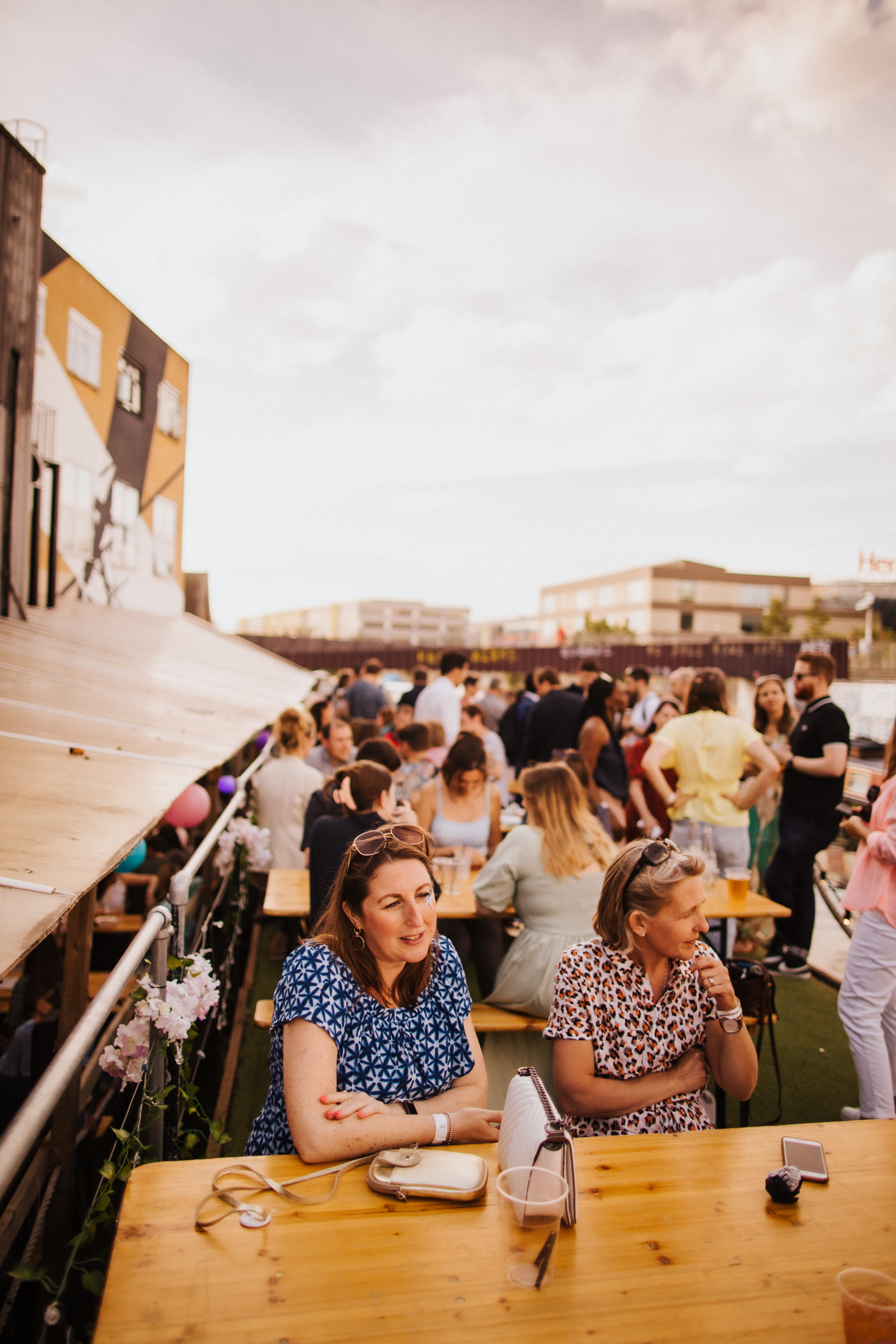 Outdoor networking event at Mary Read Boat, vibrant gathering with lively atmosphere.