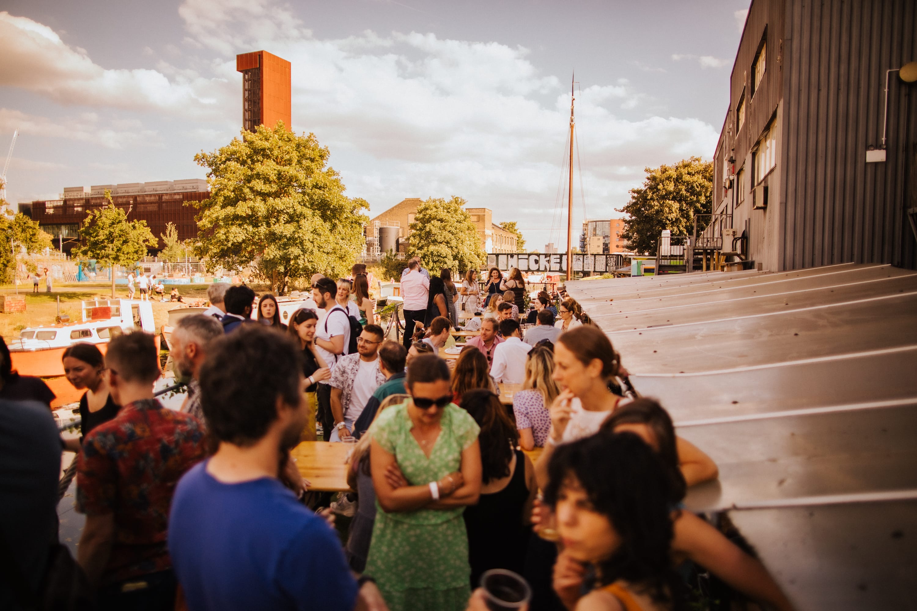 Vibrant outdoor gathering at Mary Read Boat, Hackney Wick; ideal for summer networking events.