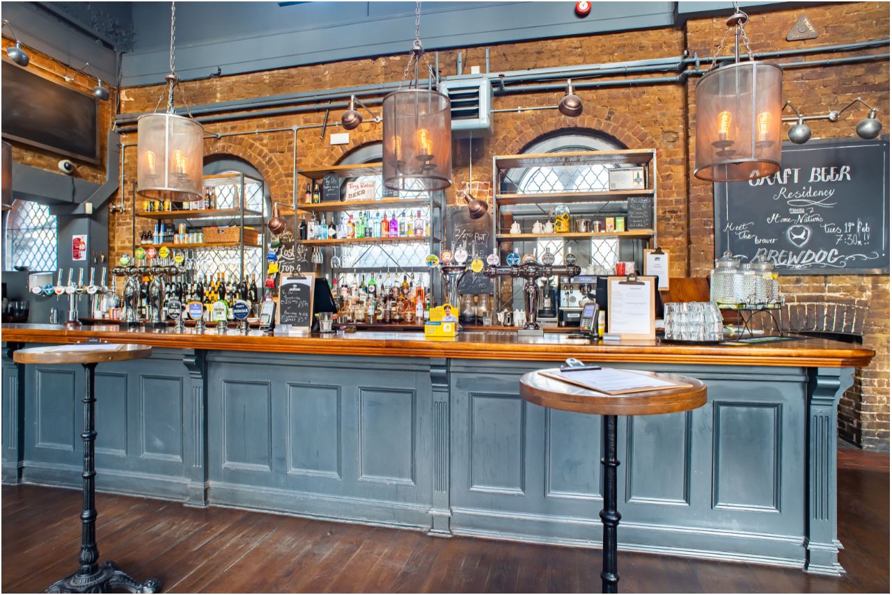 Stylish bar area in The Phoenix, Denmark Hill for networking events and cocktail receptions.
