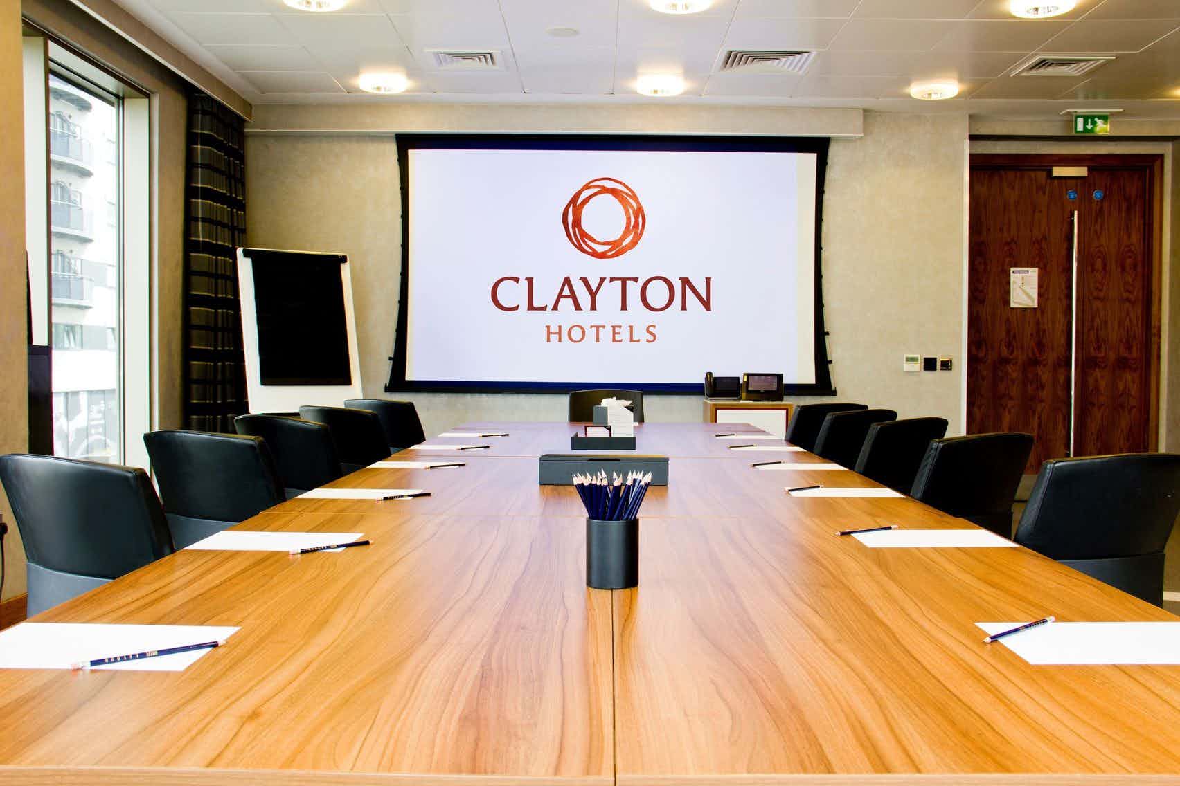 Meeting Room 9 at Clayton Hotel Birmingham, spacious table for professional gatherings.