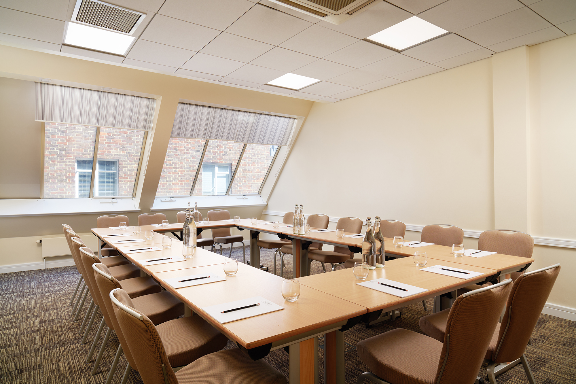 Marlborough 1 meeting room with long table, ideal for professional gatherings and events.