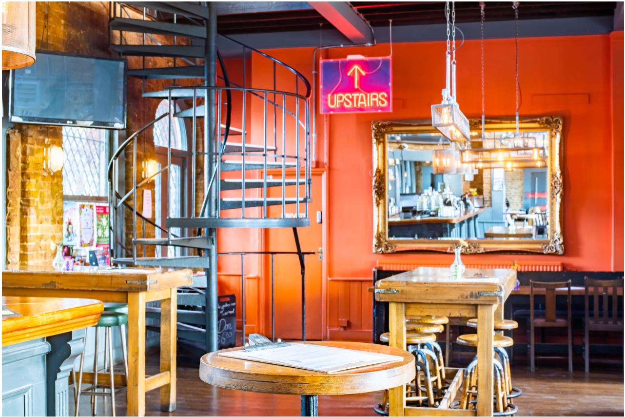 The Mezzanine at The Phoenix, Denmark Hill: modern venue with spiral staircase for events.