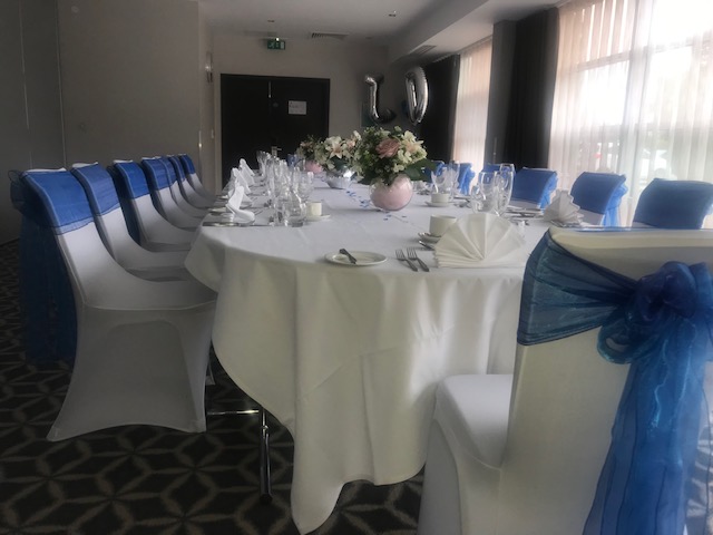 Ambassador Suite at Holiday Inn Southend, elegant table setup for weddings and corporate events.