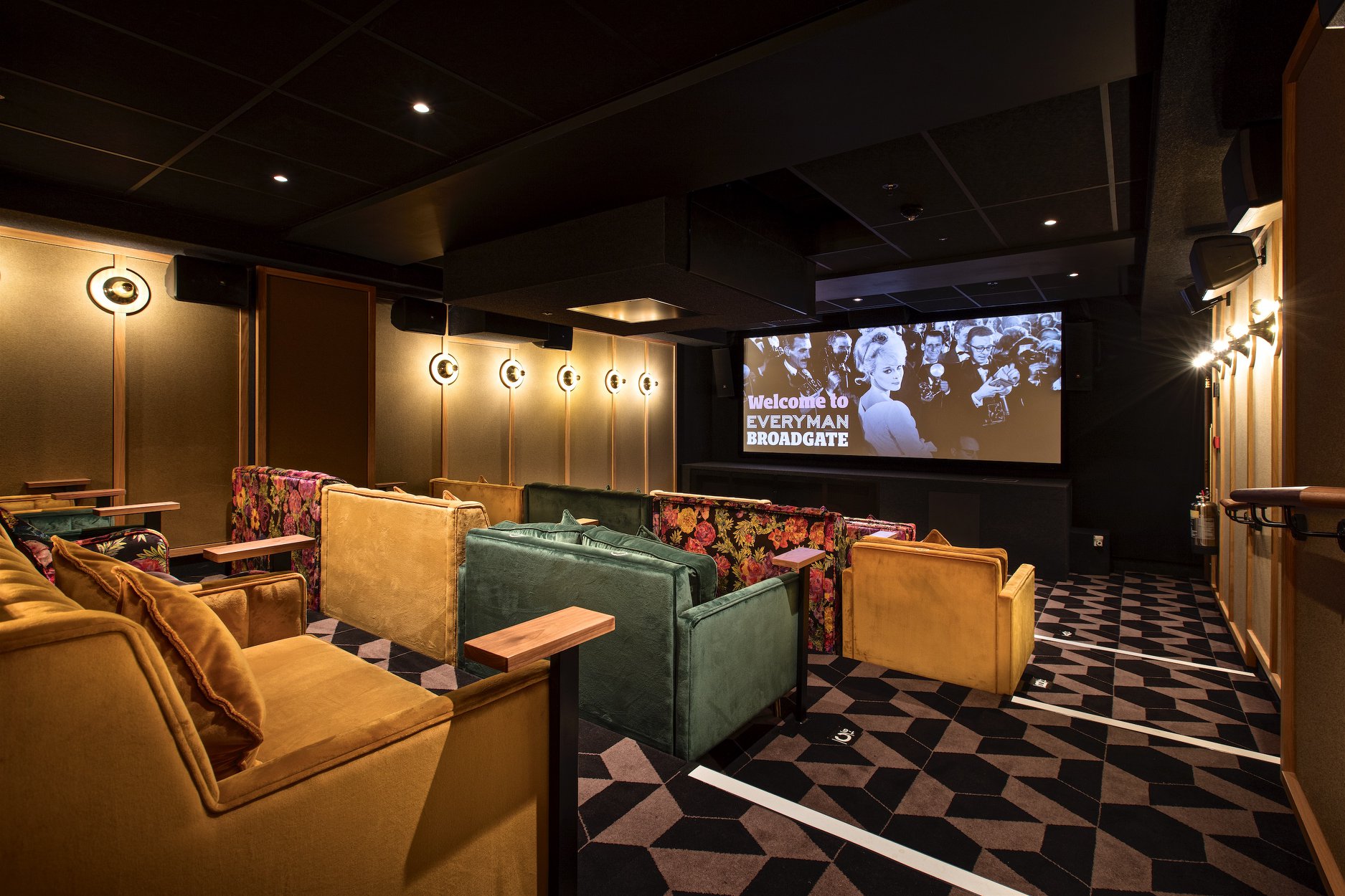 Sophisticated private screening room with cozy seating for corporate events at Everyman Broadgate.