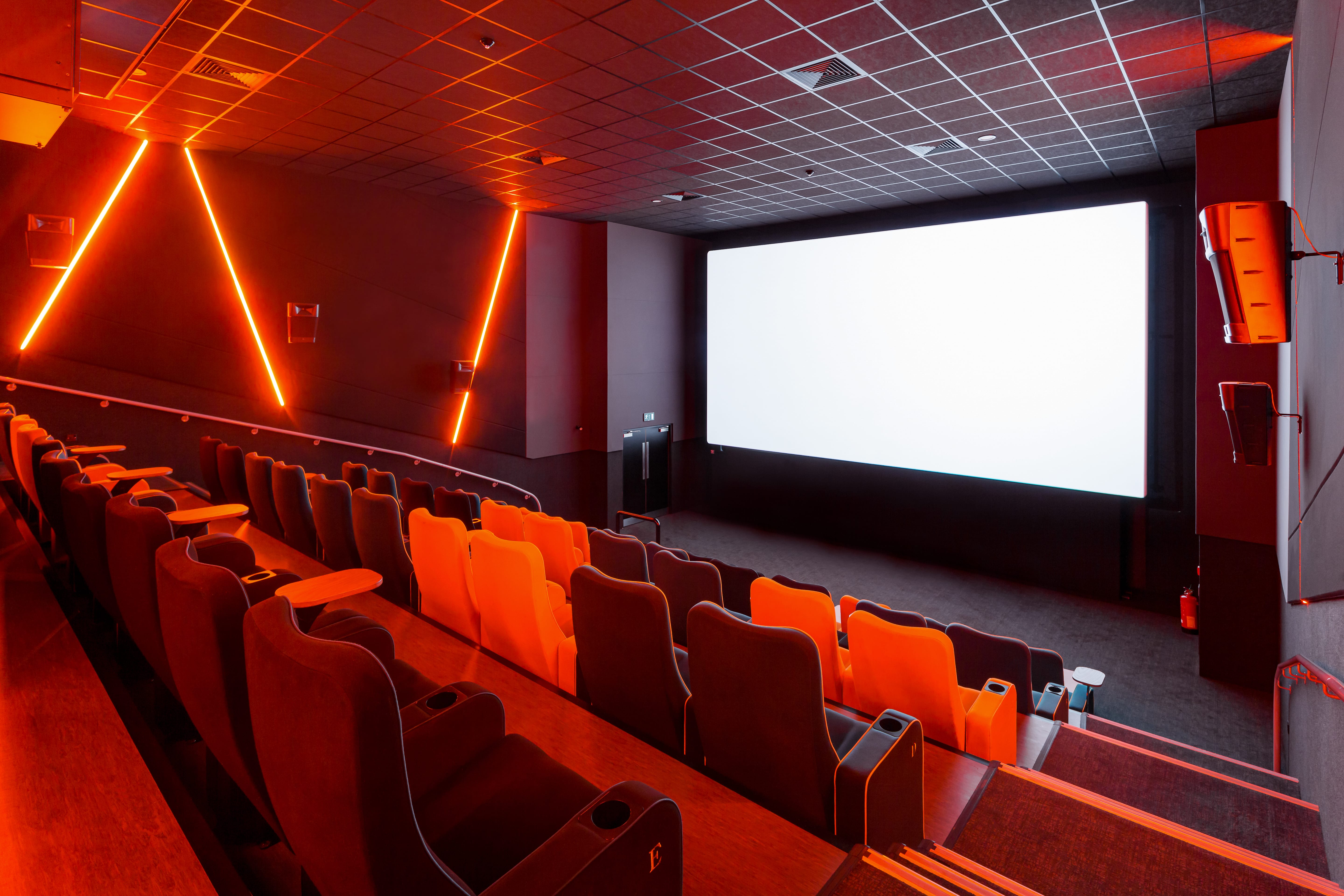 Modern cinema Screen 6 at The Light Cinema Stockport with tiered seating for events.
