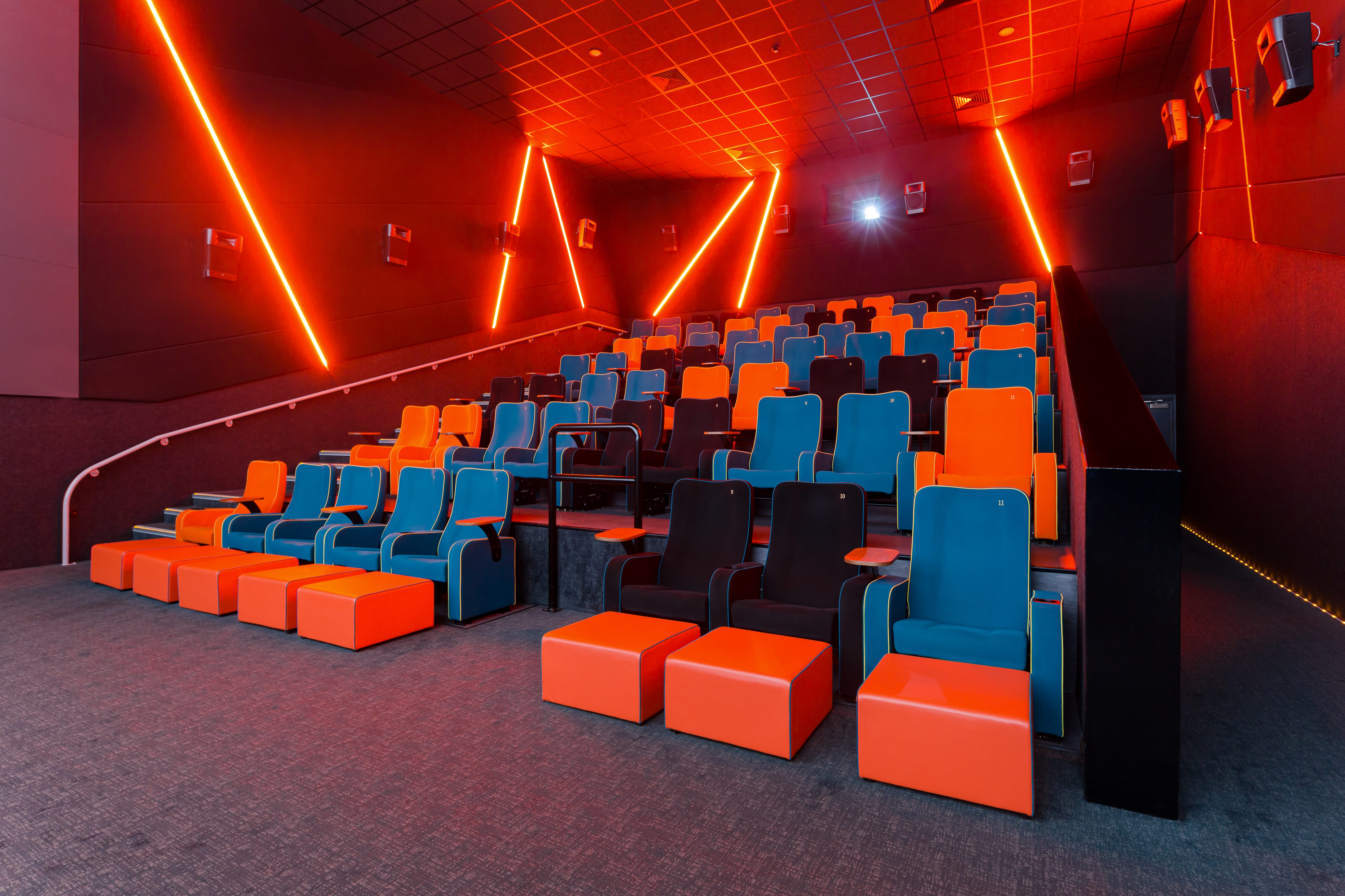 Modern event space with tiered seating and dynamic lighting at The Light Cinema Stockport.