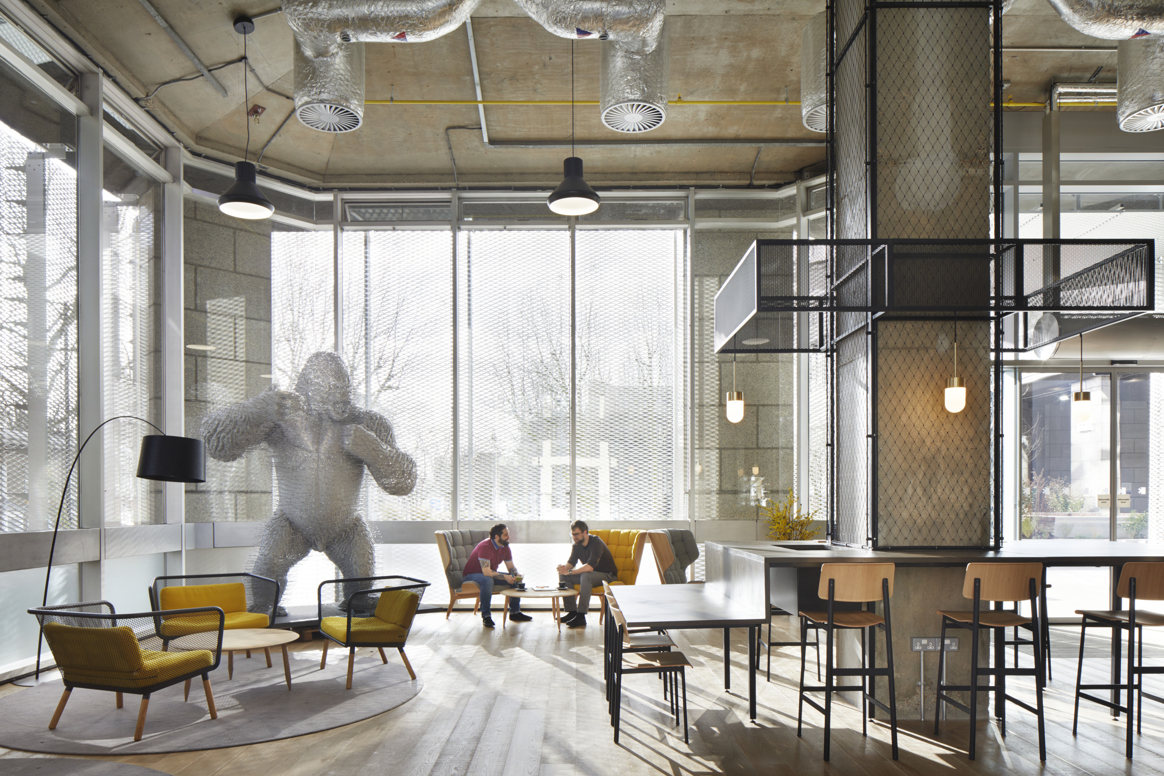 Modern open-concept meeting space with natural light for creative events and brainstorming.