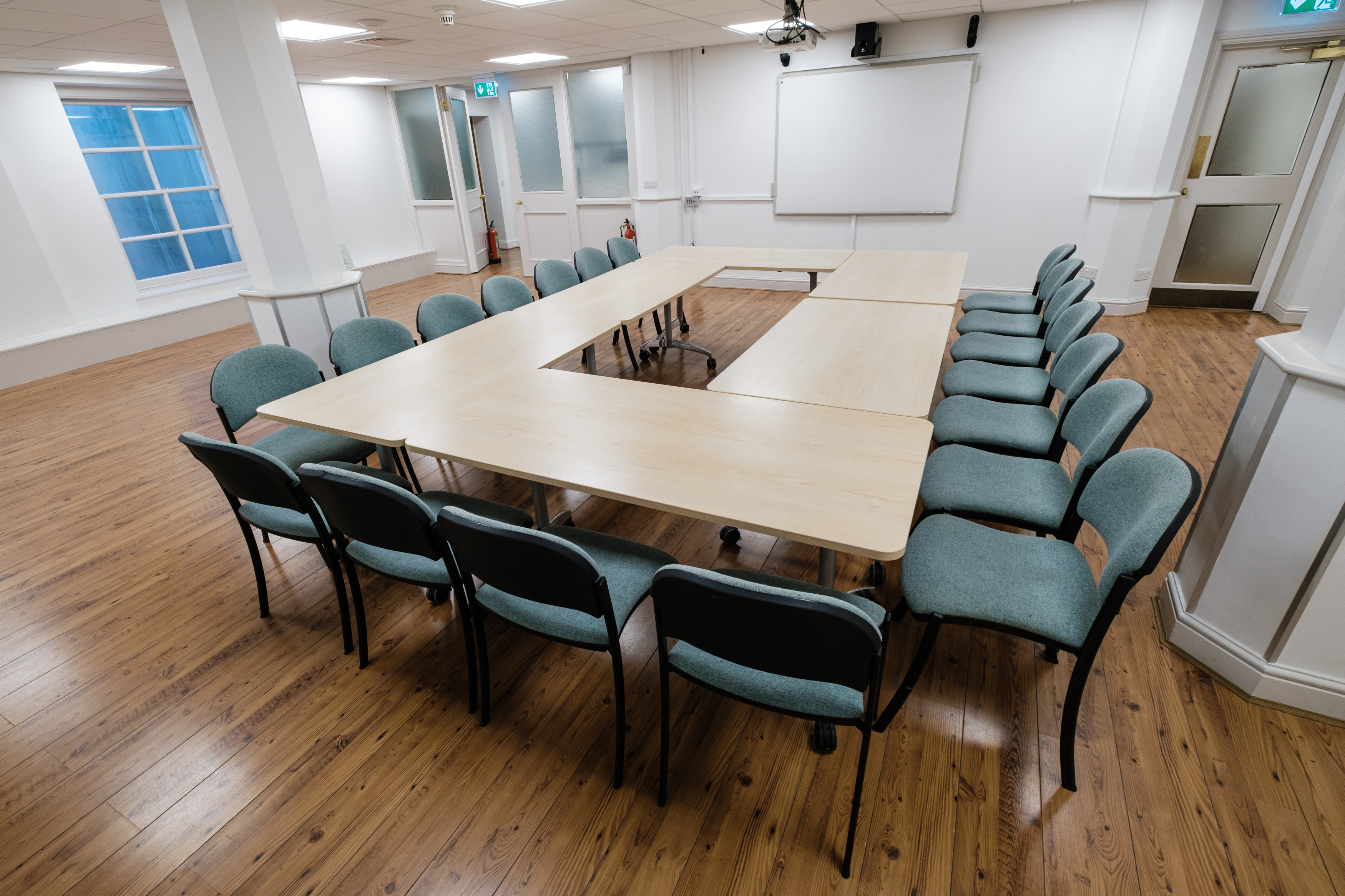 Susanna Barford Room in Southwark Cathedral, U-shaped table for corporate meetings.