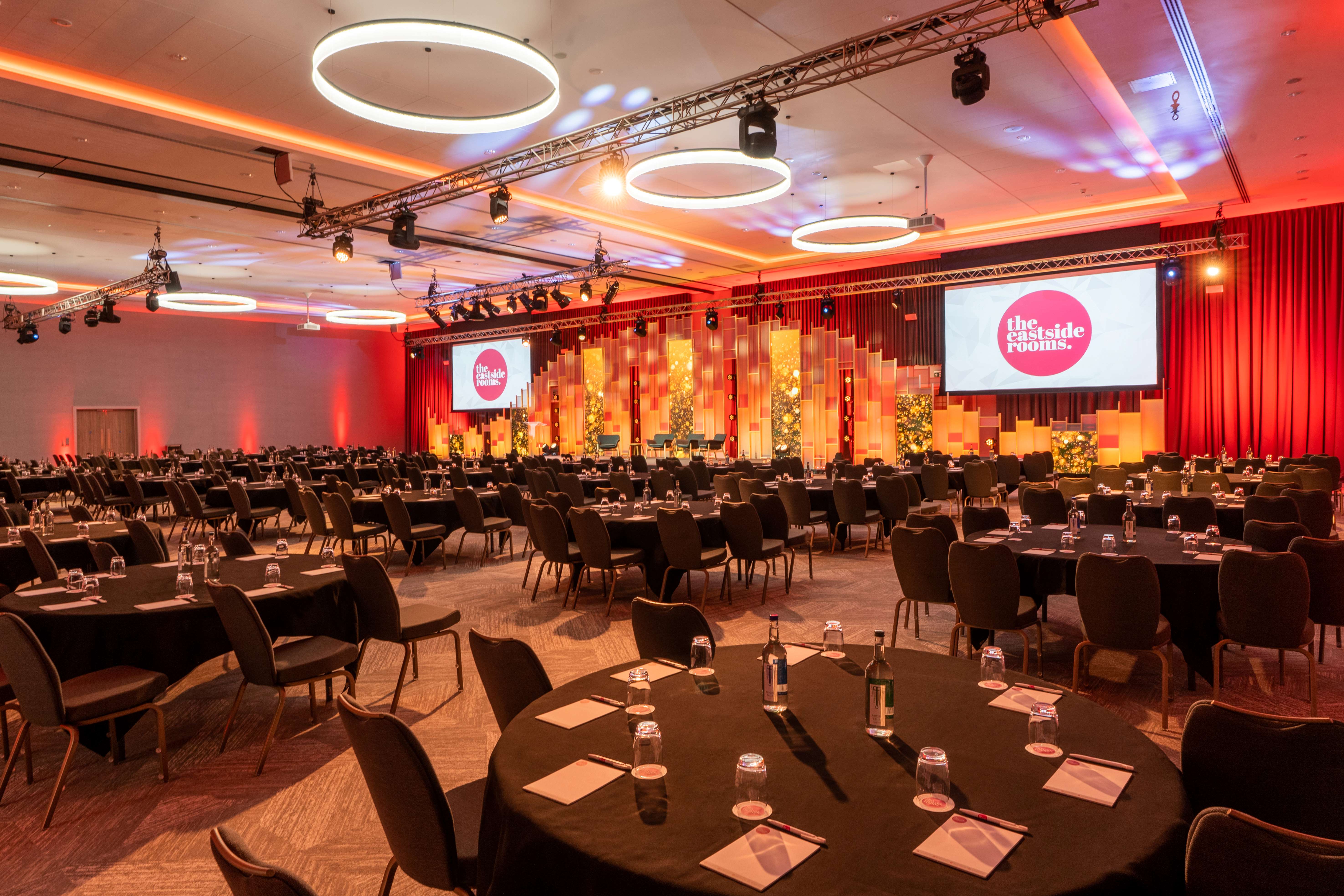 Affinity Suite event space with round tables, ideal for conferences and galas.