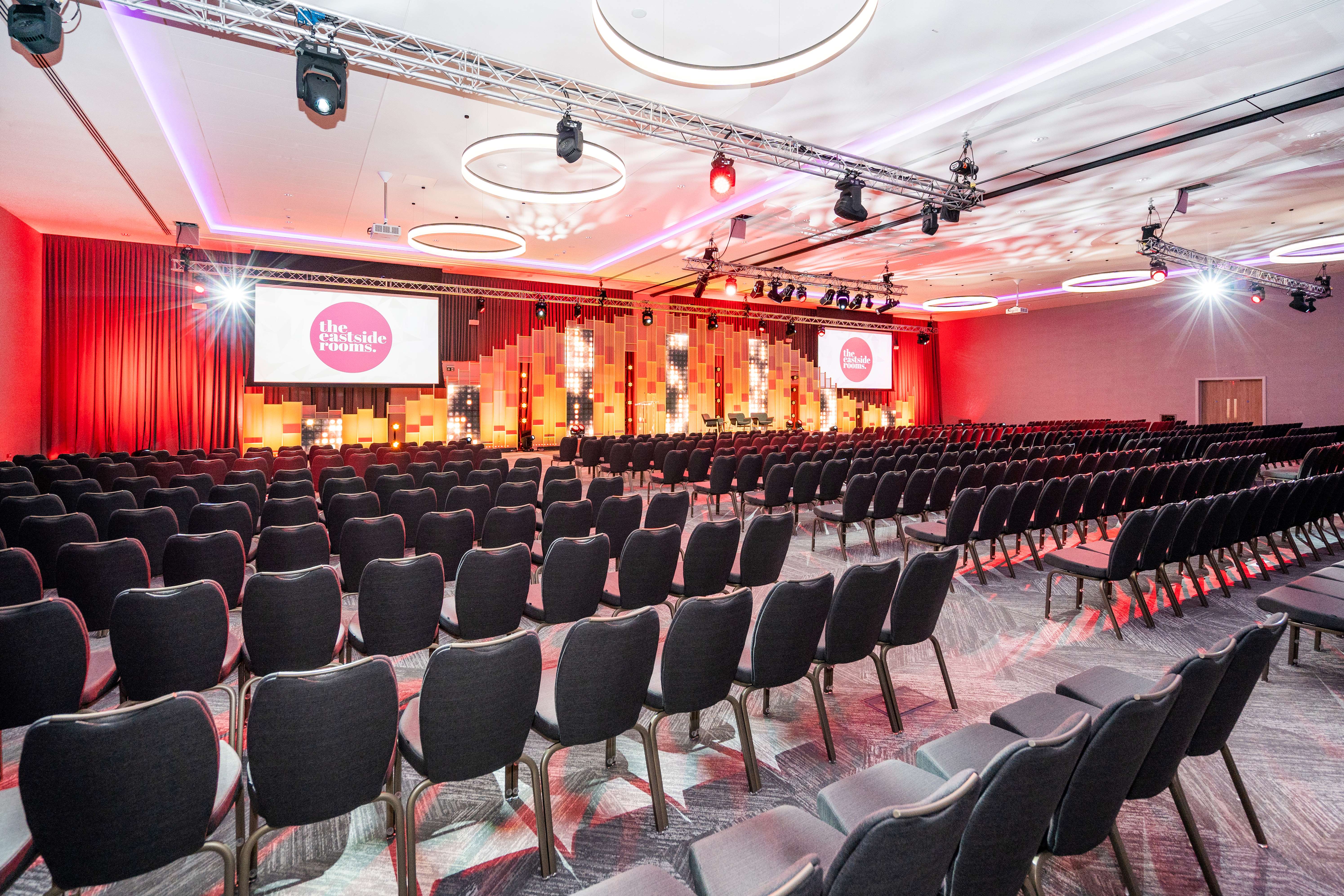 Affinity Suite event space with seating for conferences and presentations.