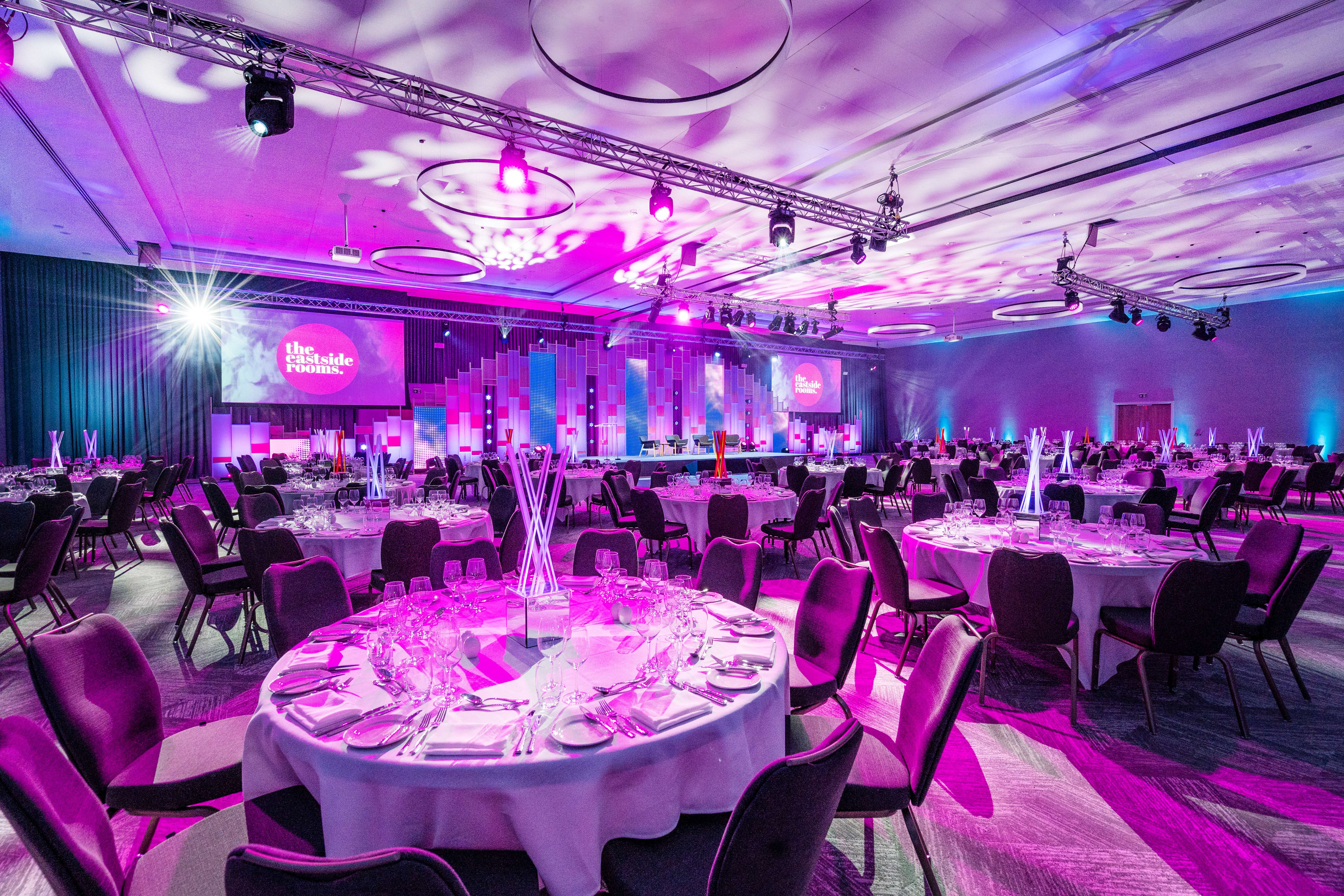 Affinity Suite at The Eastside Rooms, elegant gala venue with fine dining and purple lighting.