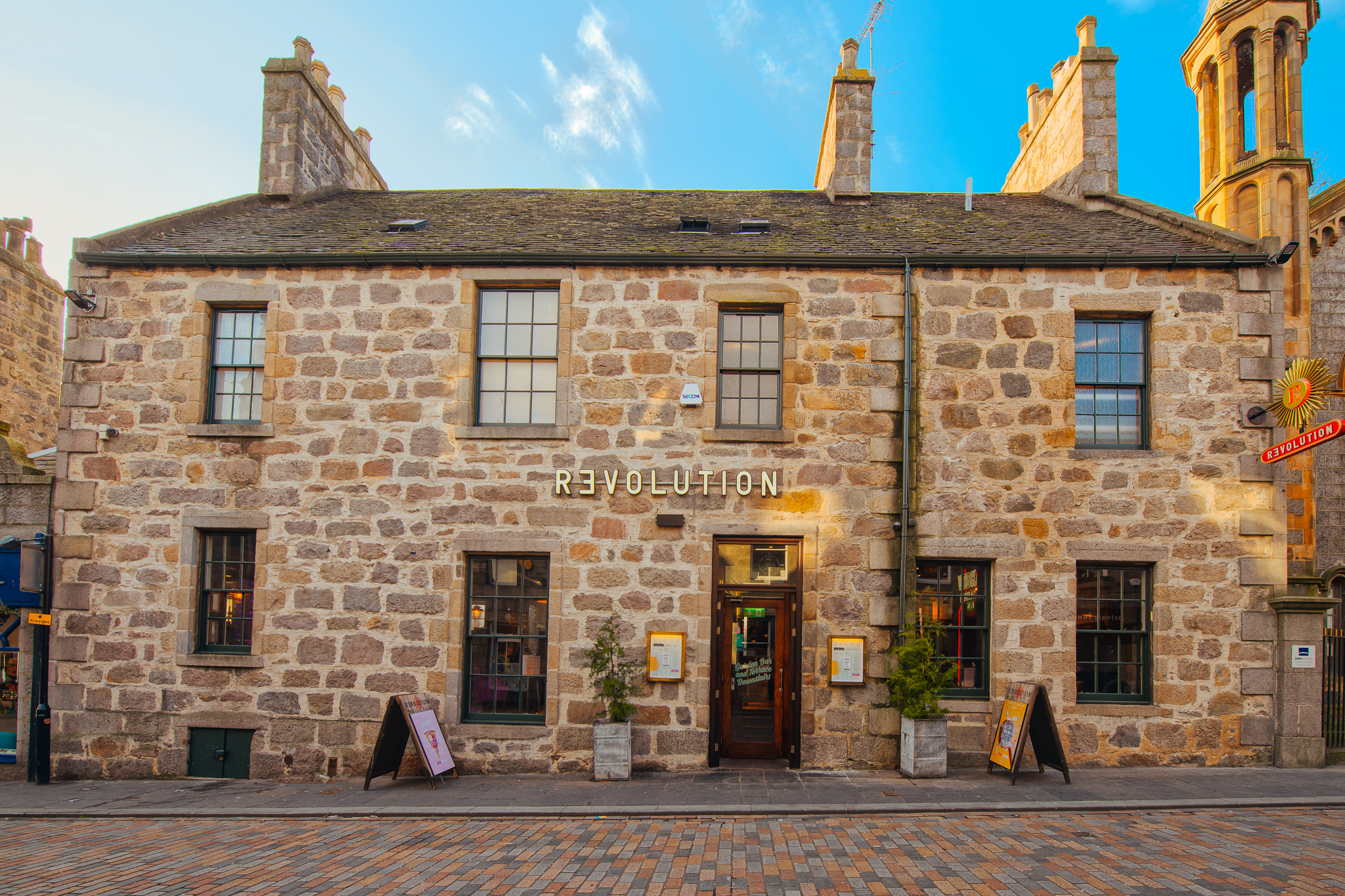 Charming stone venue for exclusive hire in Revolution Aberdeen, perfect for events.
