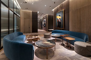 Hayward Gallery lounge with plush blue seating for networking events in London.