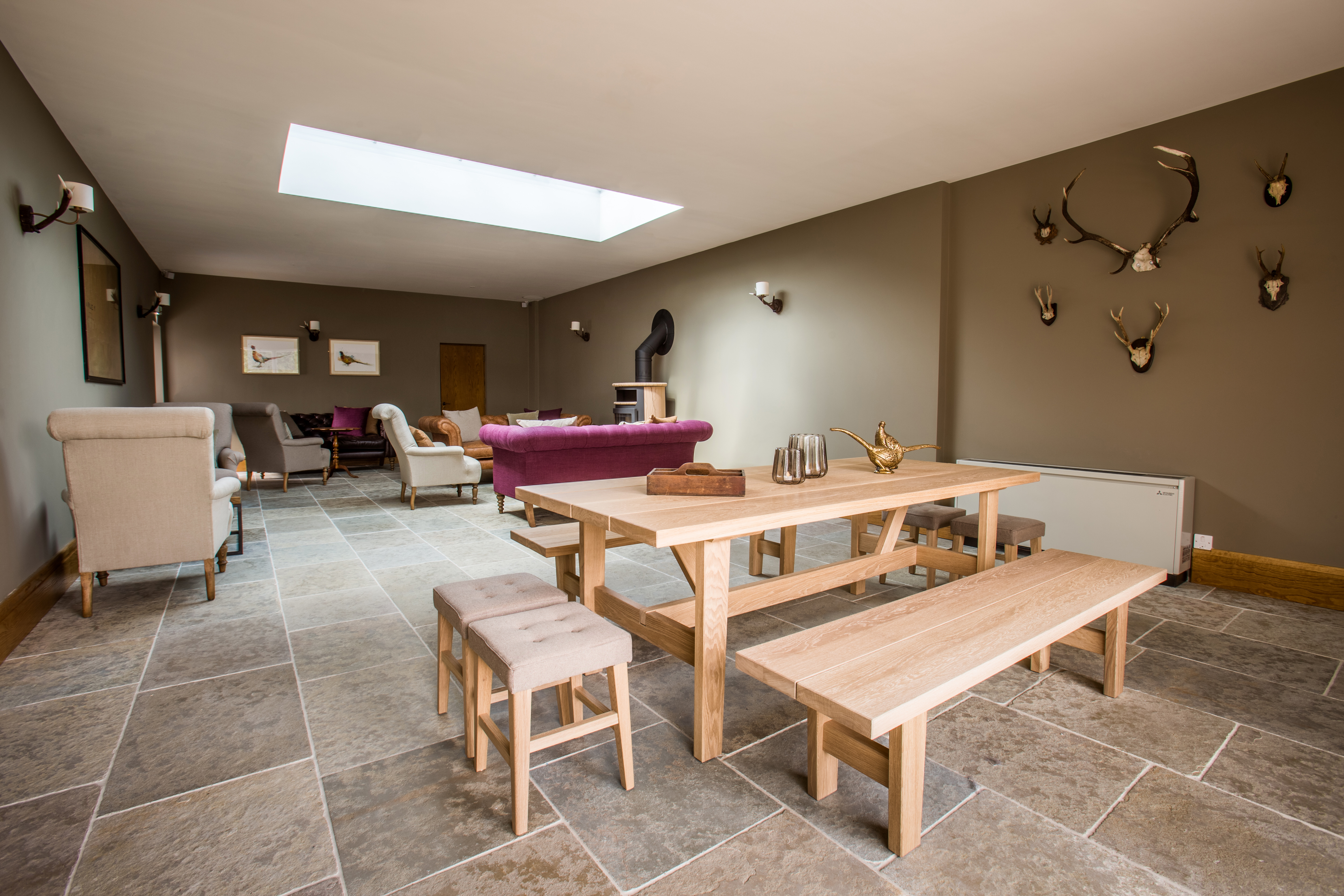 Turner Suite at Arley House: modern meeting space with wooden table, ideal for workshops.