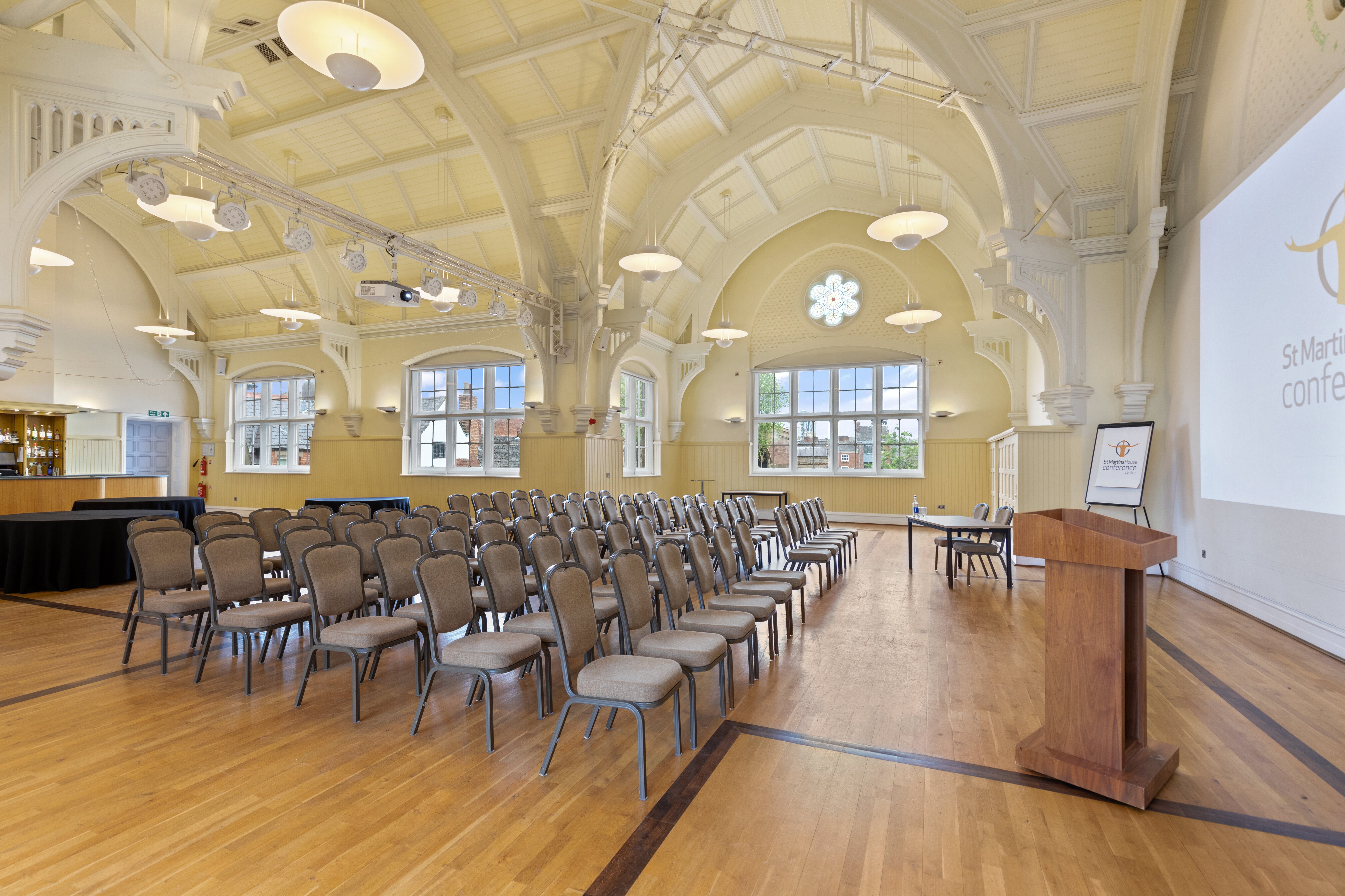 Grand Hall at St Martins House, spacious conference venue with high ceilings and natural light.