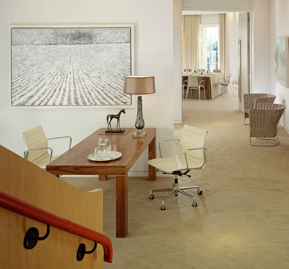 Sophisticated meeting space with modern furnishings at Coworth Park for events.