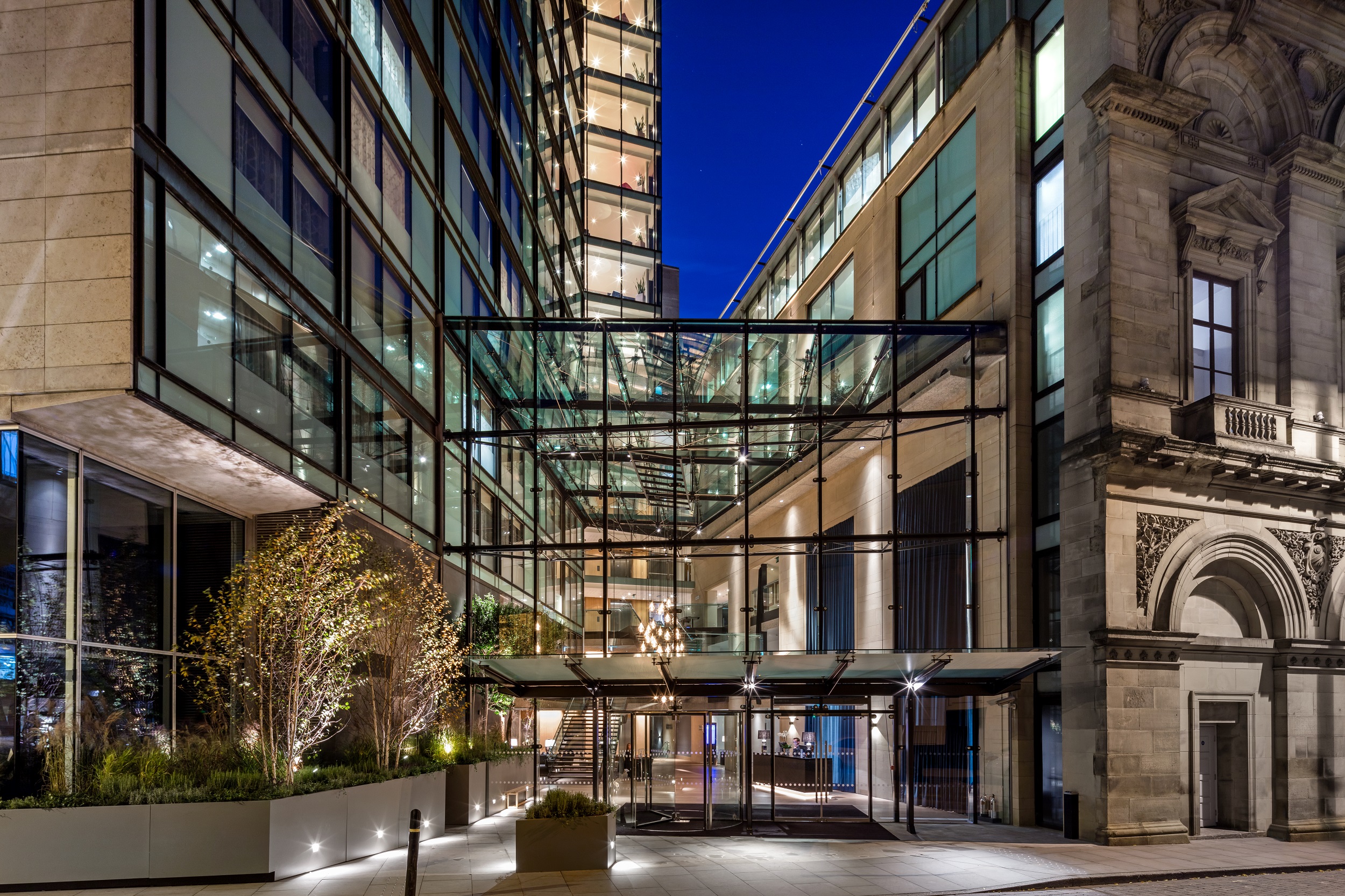 Modern event space with glass facade in The Edwardian Manchester, ideal for meetings and conferences.