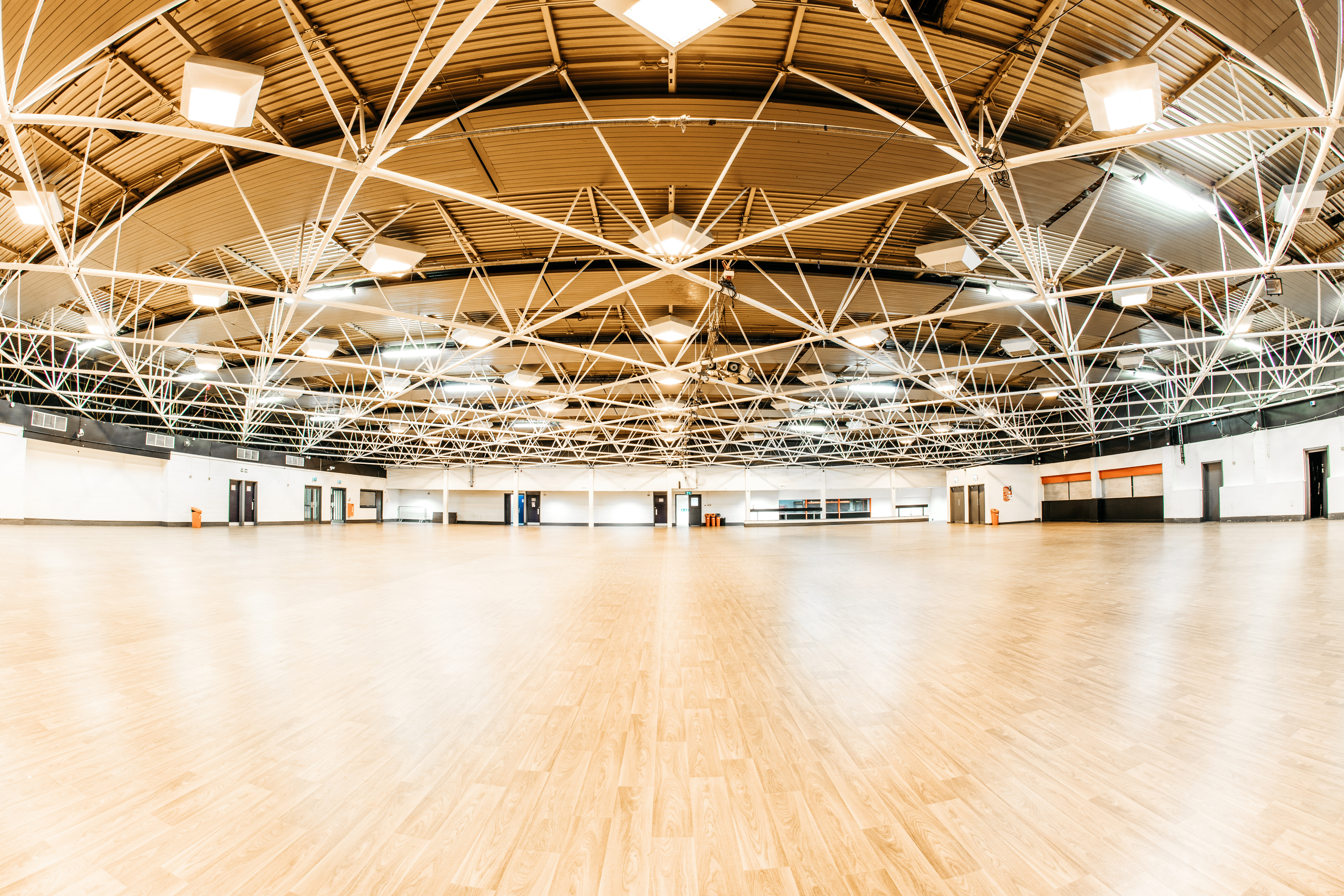 Spacious Byron Hall venue with high ceilings, perfect for conferences and banquets.