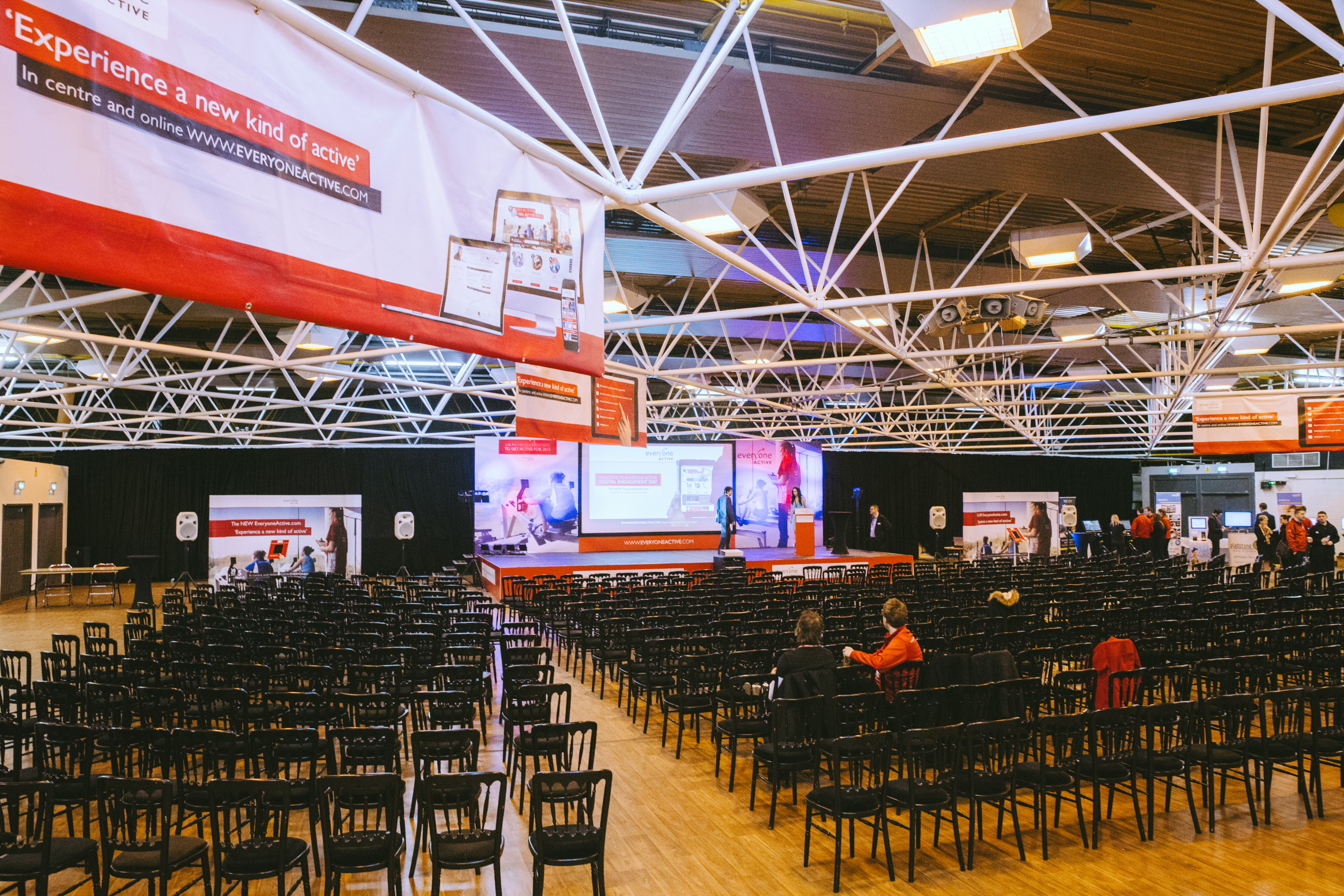 Spacious Byron Hall venue set for a professional conference with organized seating.