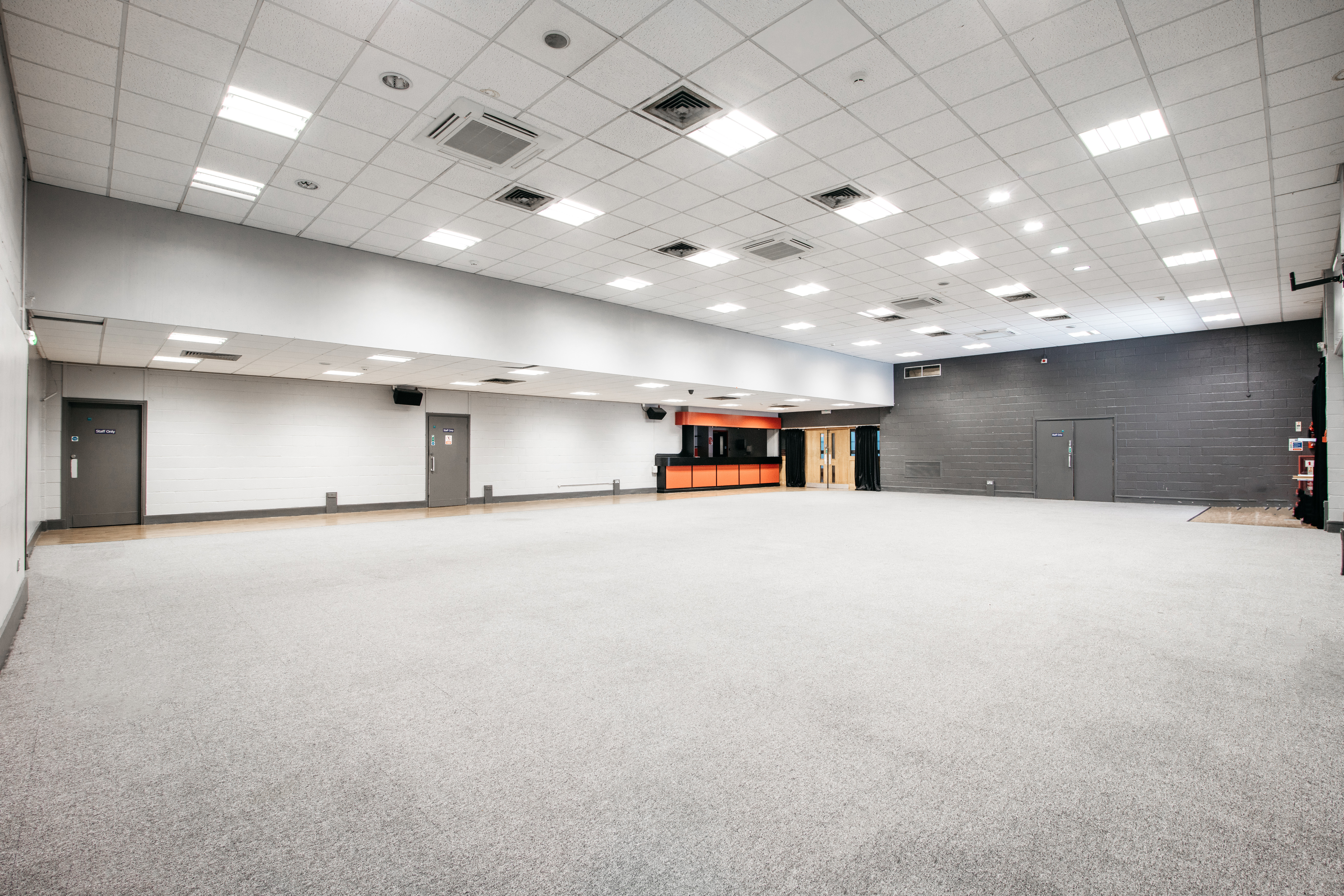 Spacious Masefield Suite venue with neutral walls, perfect for conferences and events.