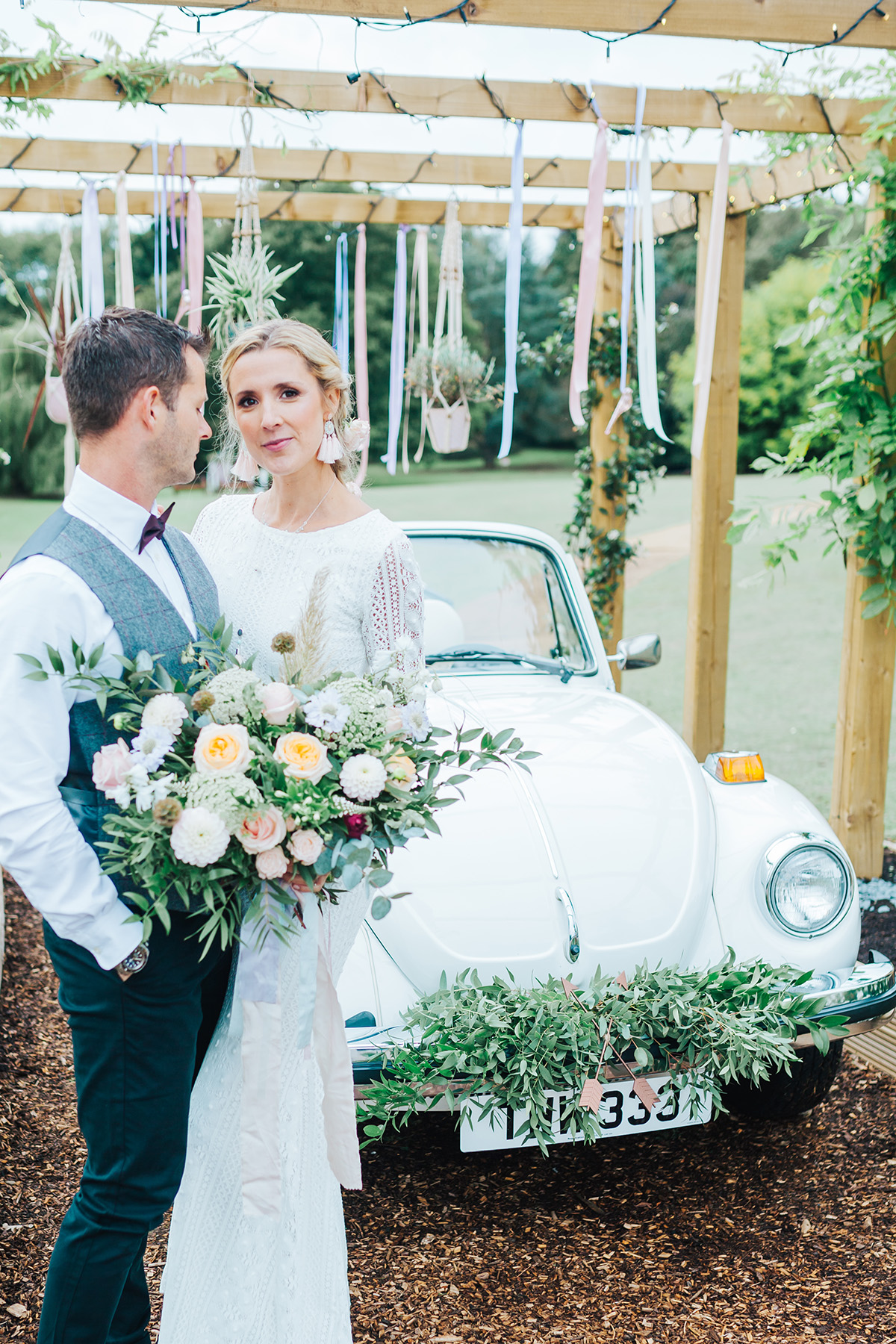 Outdoor wedding setup at Vanstone Park with a wooden arbor and elegant decor.