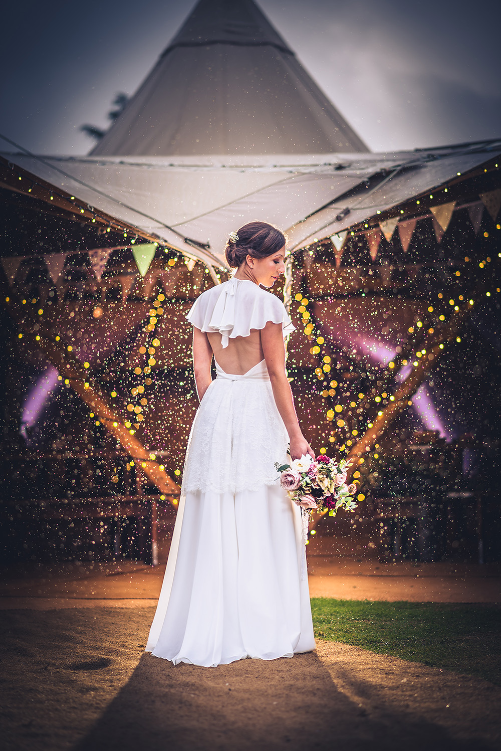 Elegant outdoor wedding venue at Vanstone Park with colorful bunting and twinkling lights.