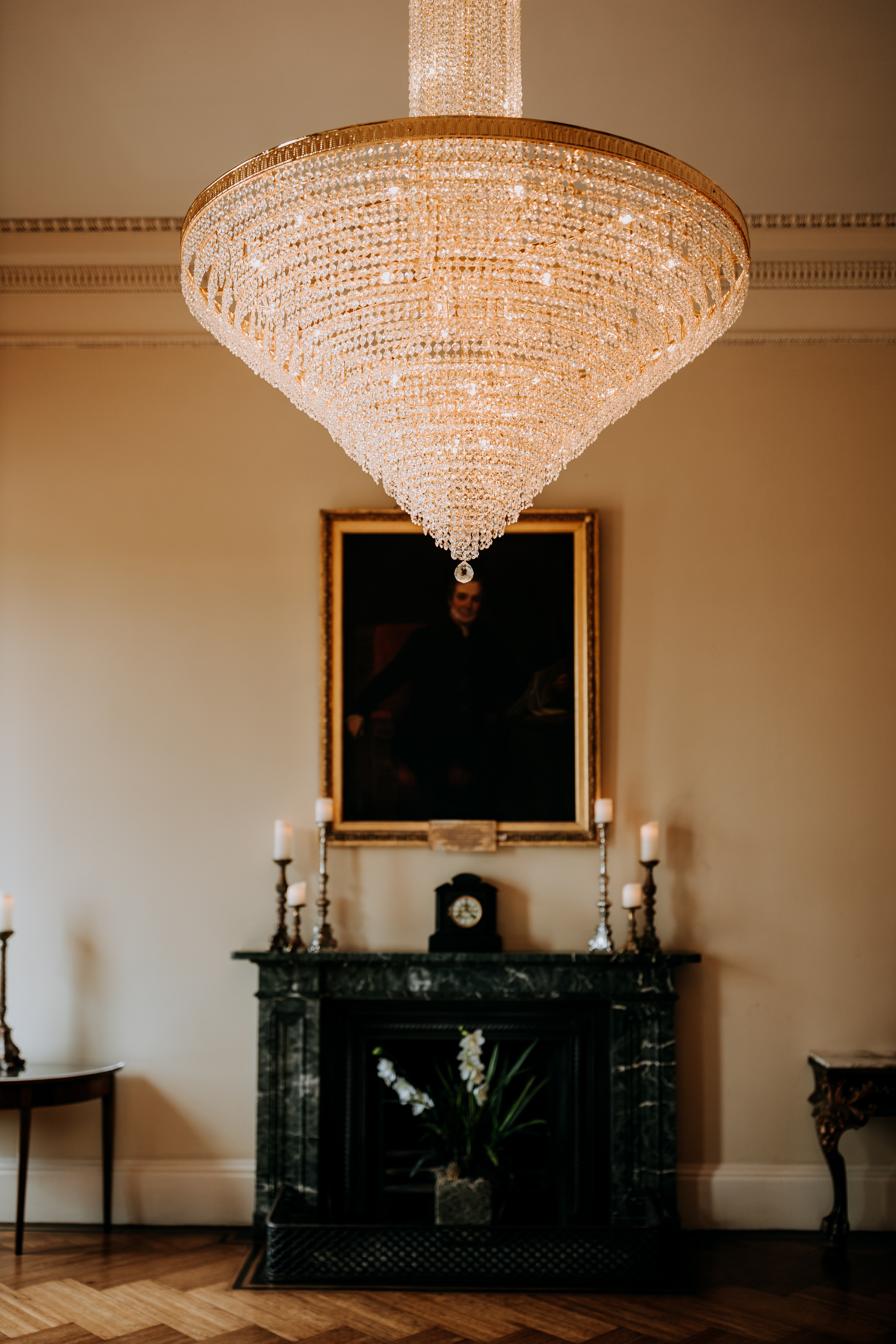 Elegant Rise Hall venue with chandelier, perfect for upscale events and intimate dinners.
