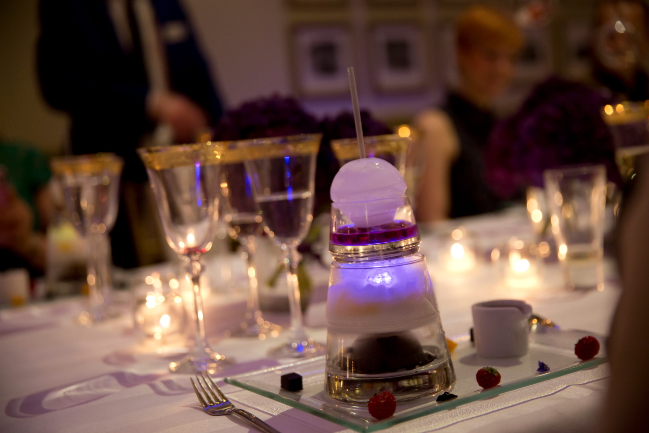 Elegant dining setup with dessert display at Rise Hall for upscale events.