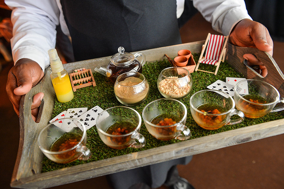 Tea tray with glass cups and decor at Rise Hall for themed event.