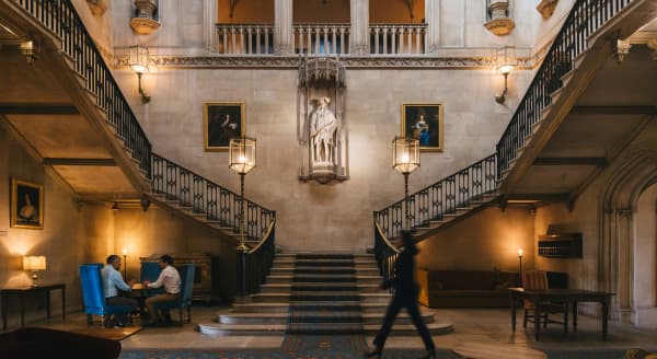 Main Hall at Ashridge House with grand staircase for corporate gala event registration.