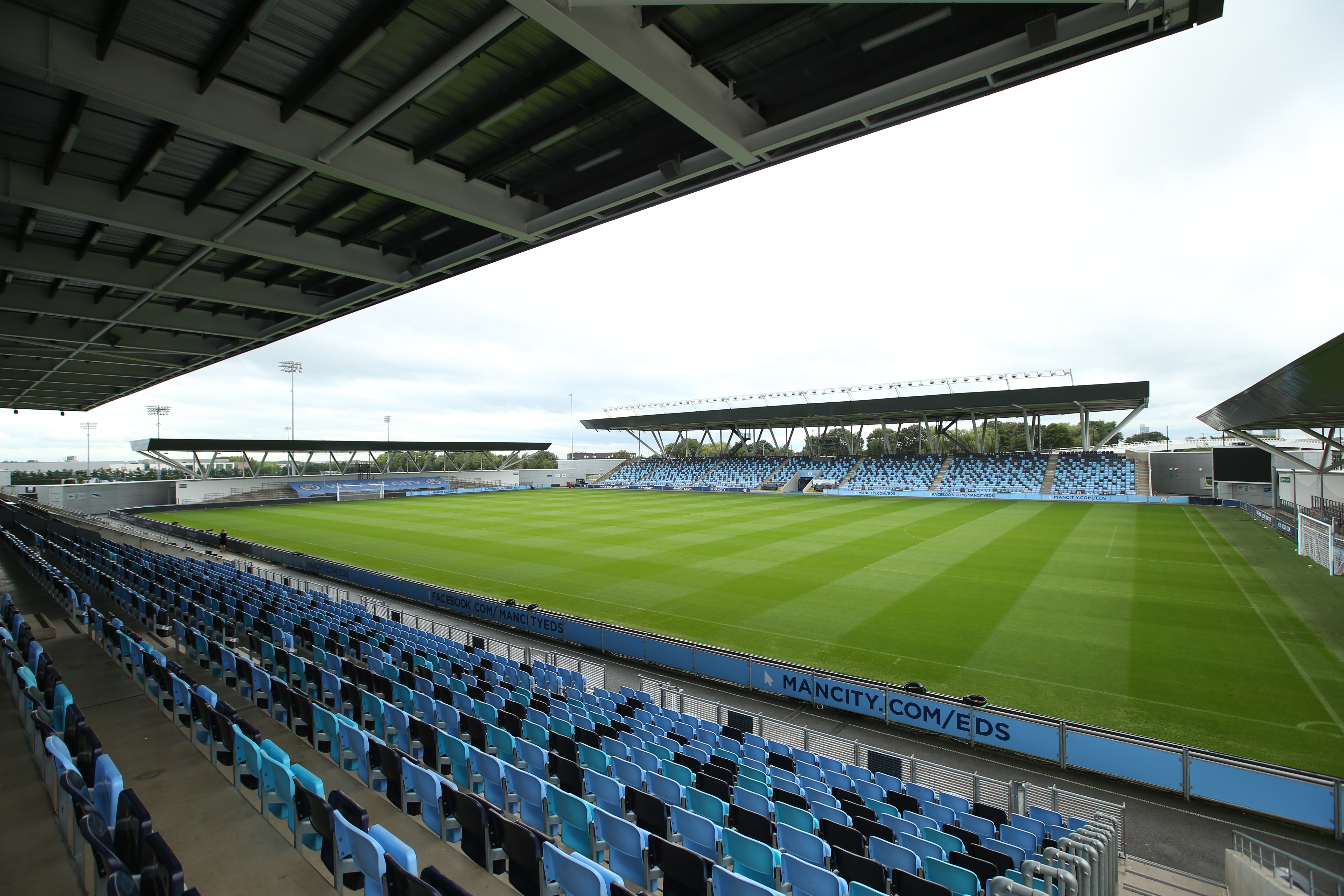 Spacious City Football Academy venue with a well-maintained pitch for events and concerts.