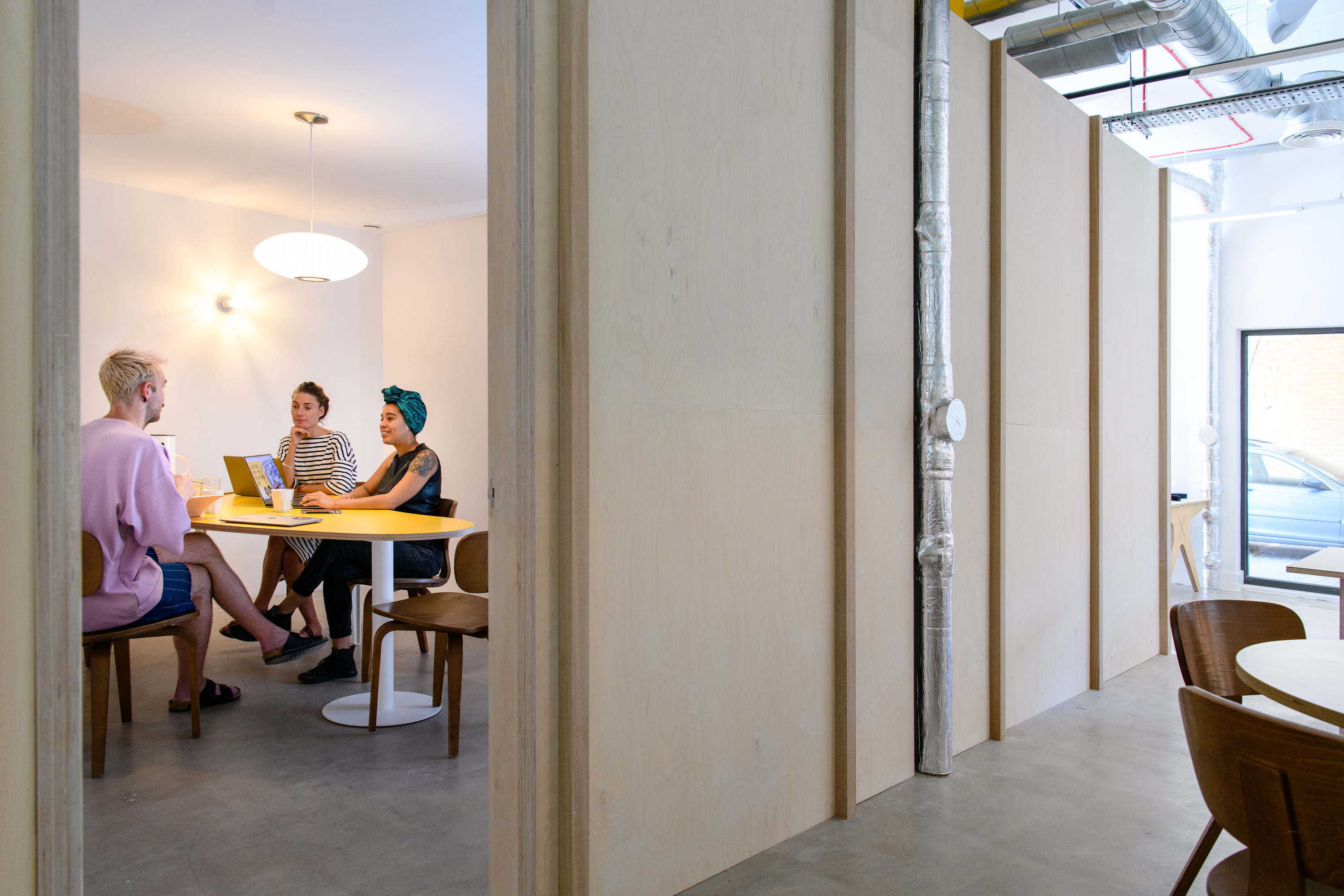 Modern meeting space with round table for collaboration at Arc Club venue hire.