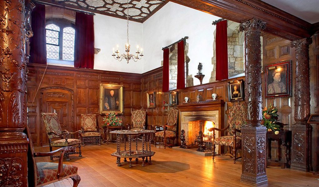 Astor Wing at Hever Castle: elegant meeting space with rich wood paneling for corporate retreats.
