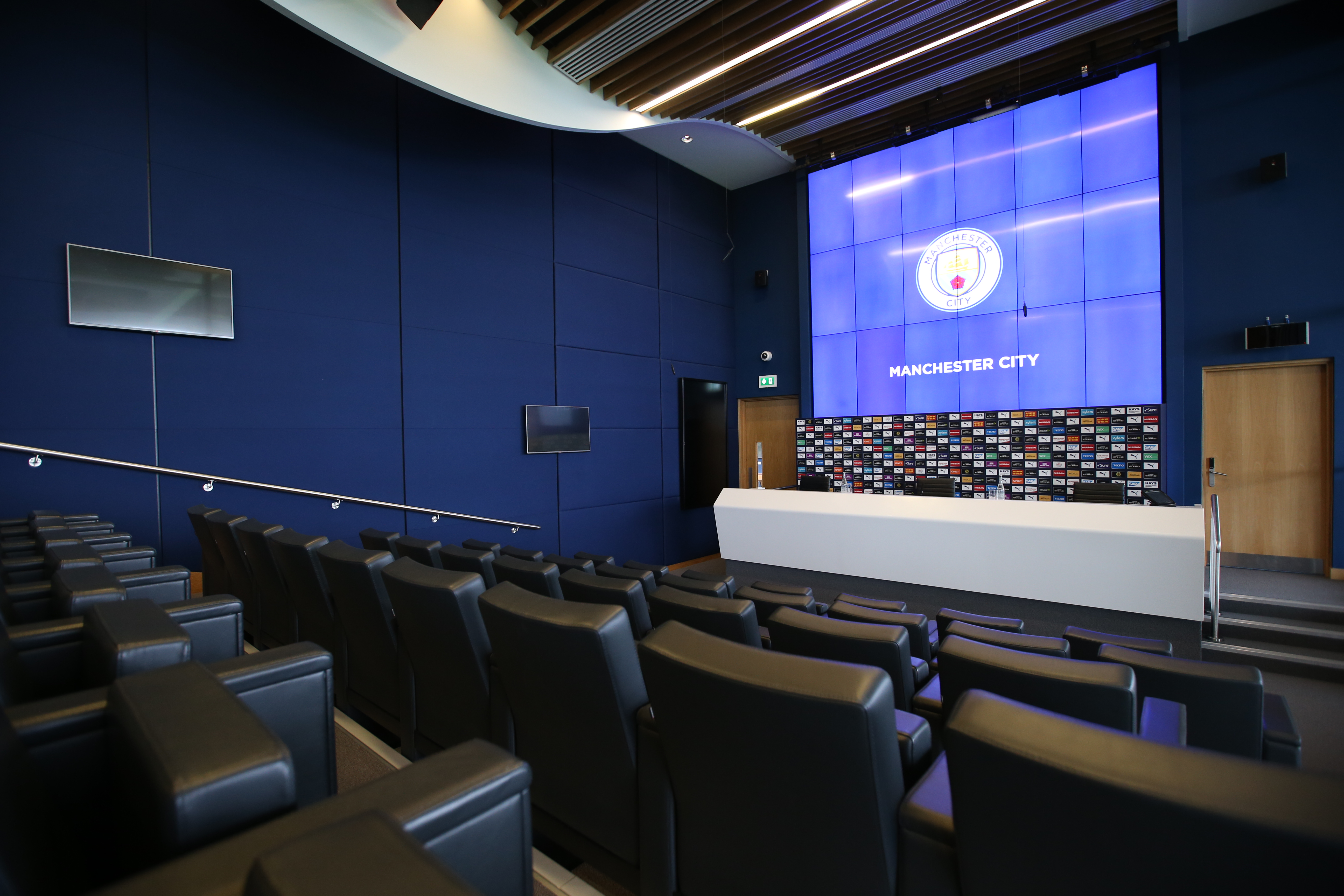 Modern conference room at City Football Academy, ideal for press events and media briefings.