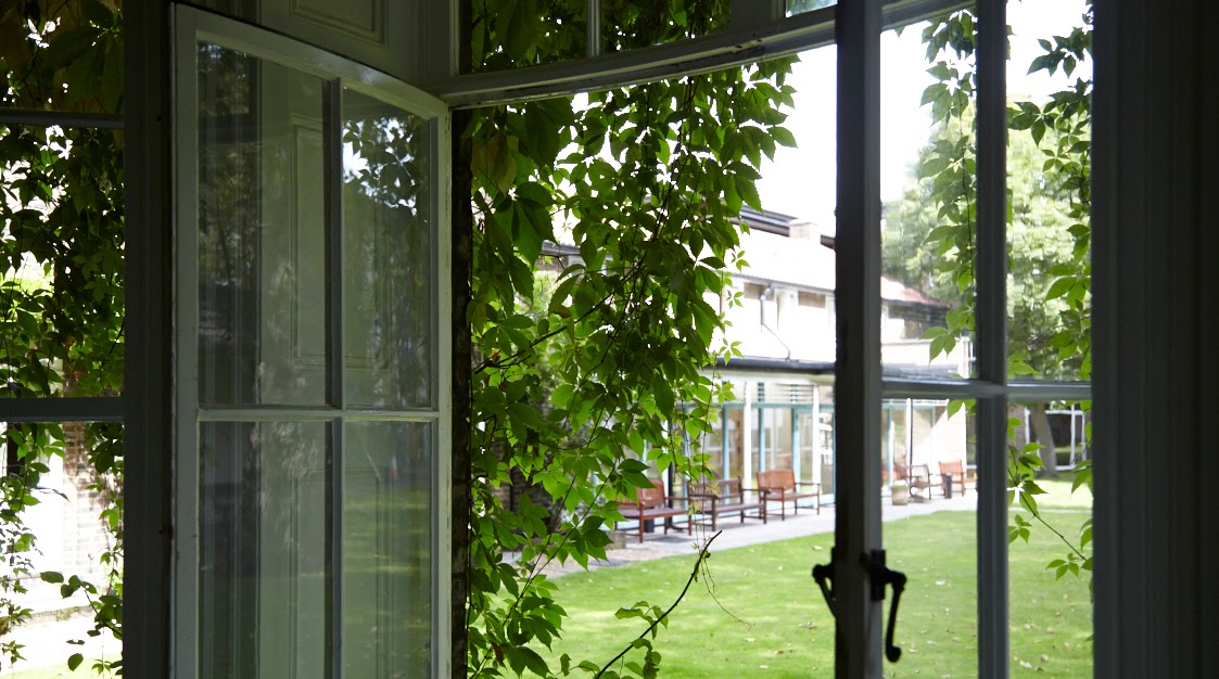 Serene Chapter room with open window, ideal for meetings and retreats.