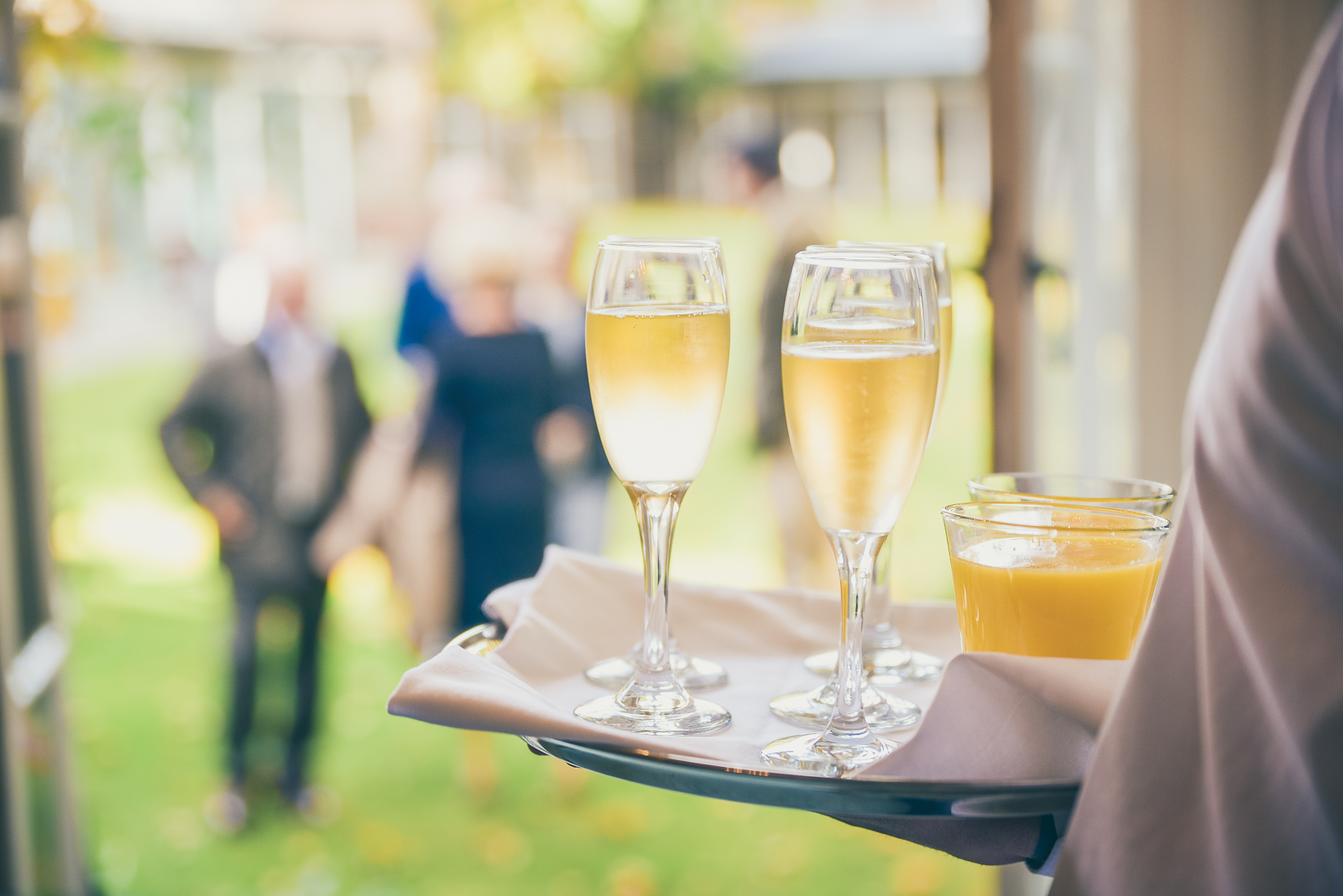 "Elegant Chapter room setup with champagne flutes for networking events at St. Katharine."