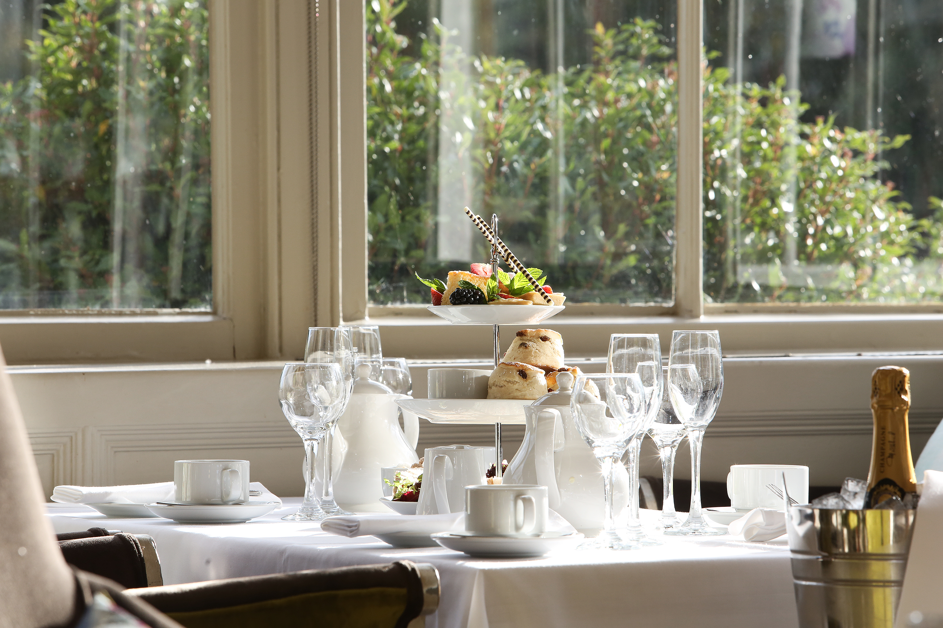Elegant table setting in Charles Suite, Pendley Manor for sophisticated meetings and events.
