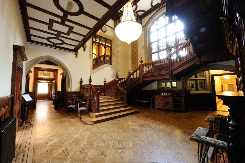 Charles Suite entrance hall with elegant wooden architecture, ideal for upscale receptions.
