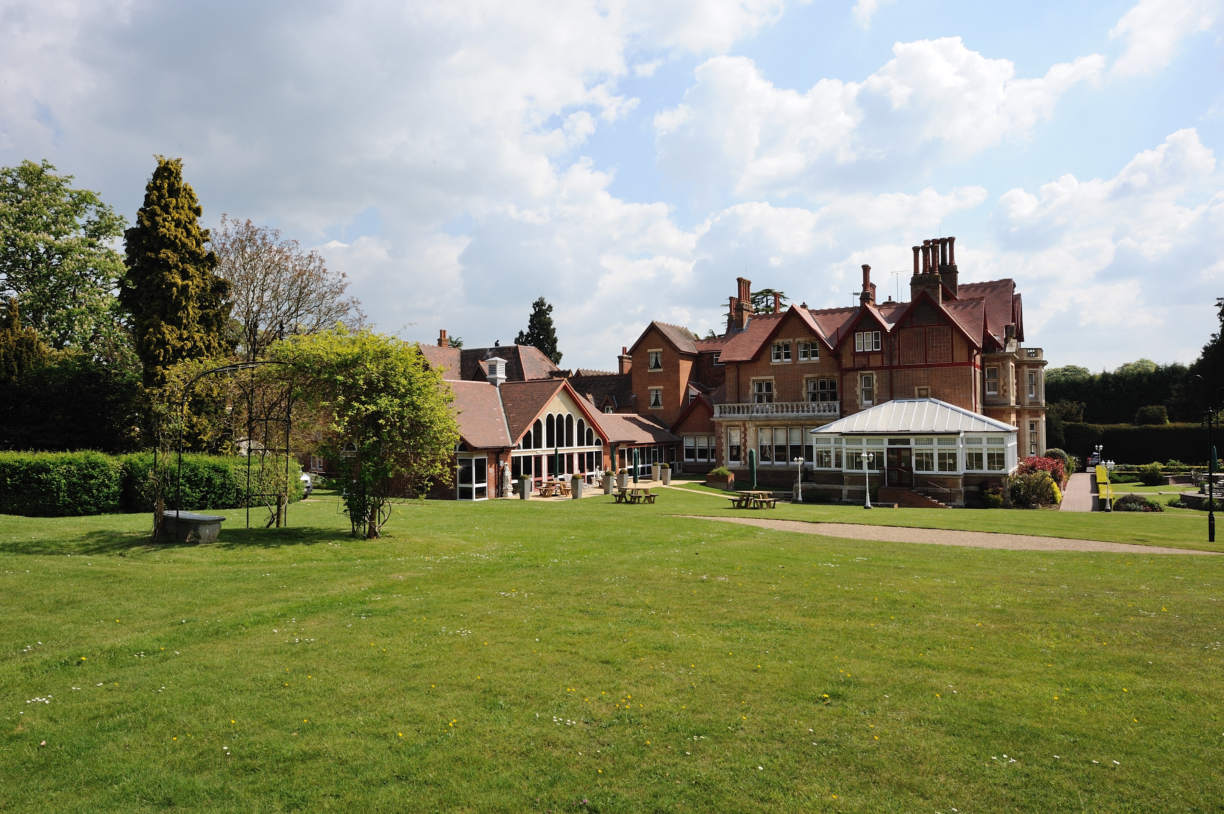 Charles Suite at Pendley Manor: elegant venue with lush lawn for weddings and events.