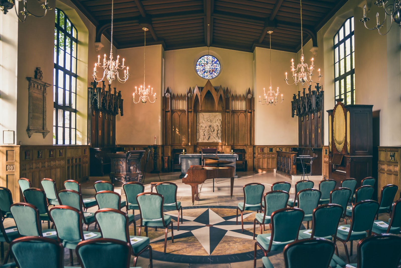 St John Groser room with stained glass, perfect for intimate gatherings and ceremonies.