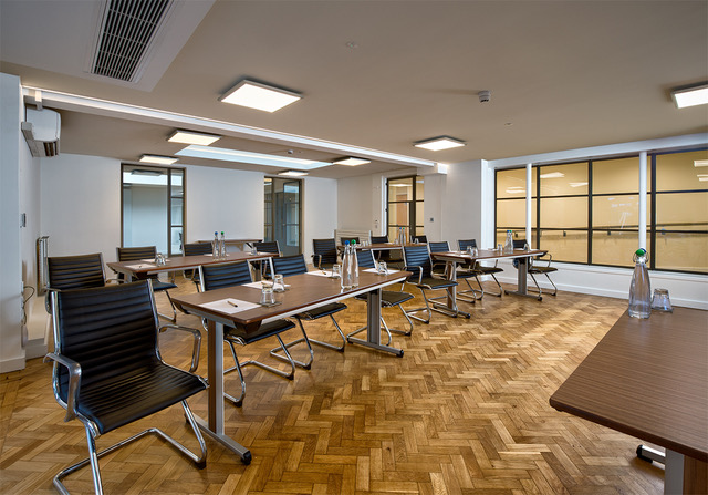 St John Groser room: modern meeting space with natural light for workshops and conferences.