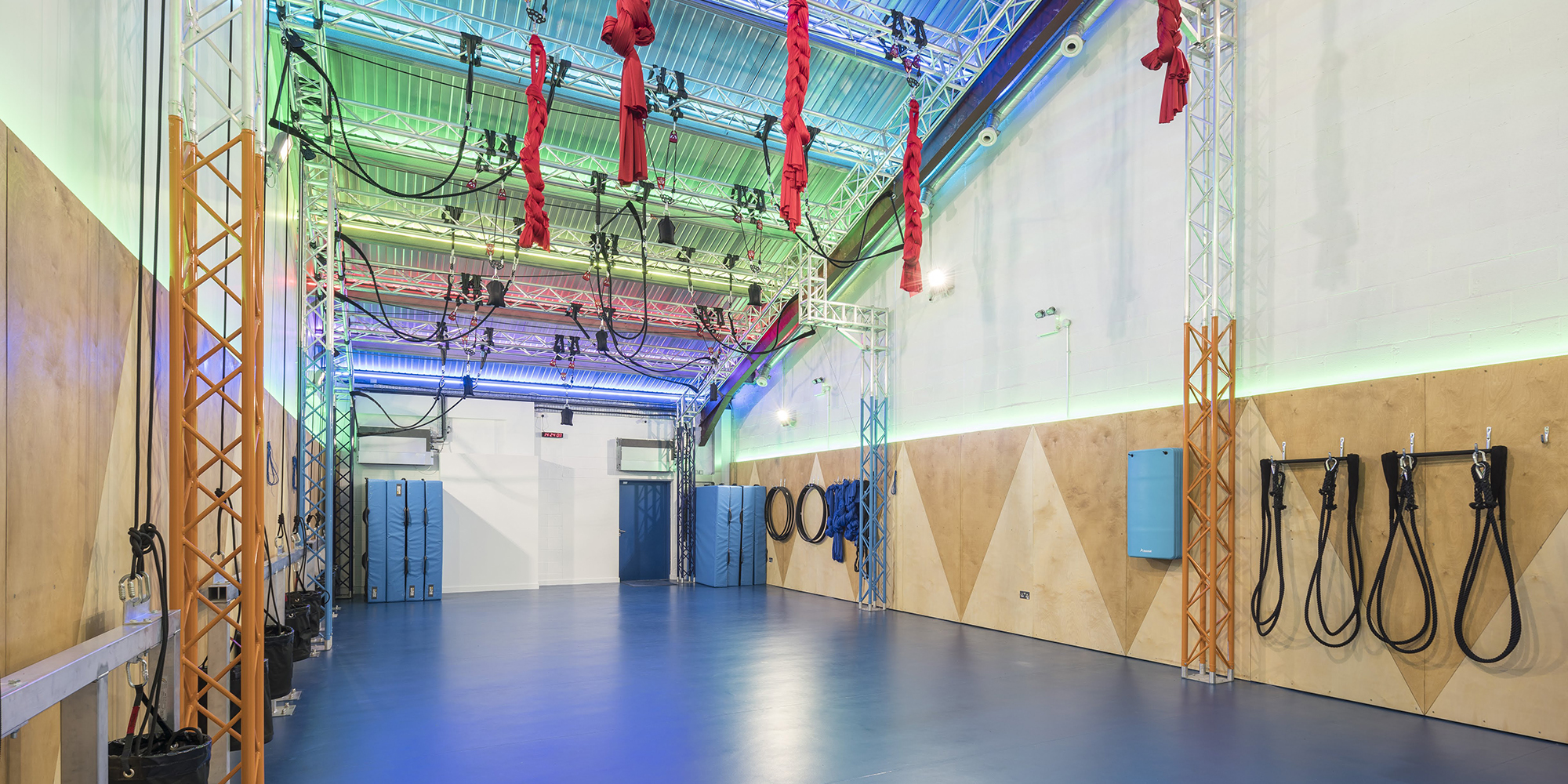 Versatile event space in Peckham with colorful lighting for workshops and performances.