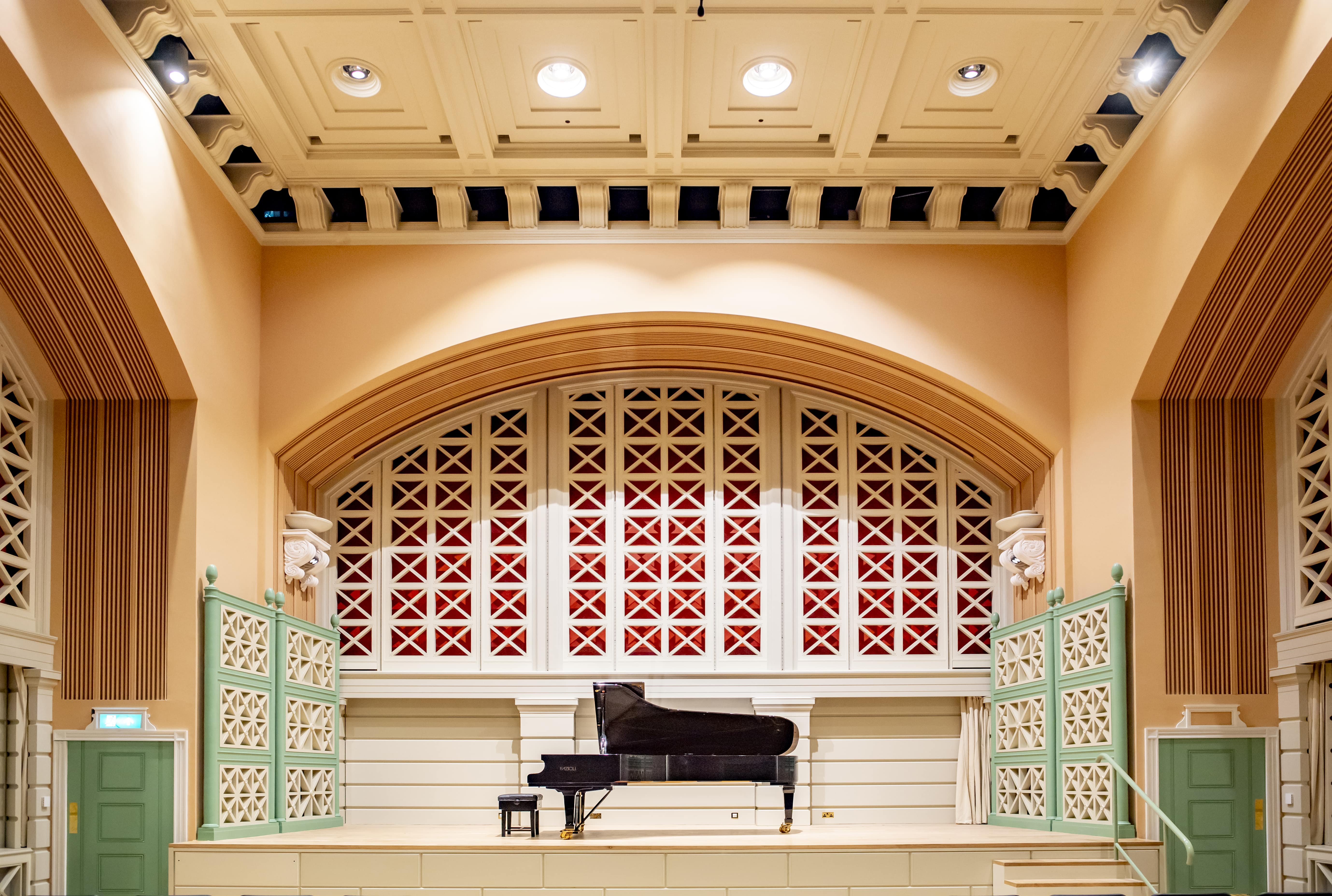 Performance Hall at Royal College of Music with grand piano, ideal for concerts and events.