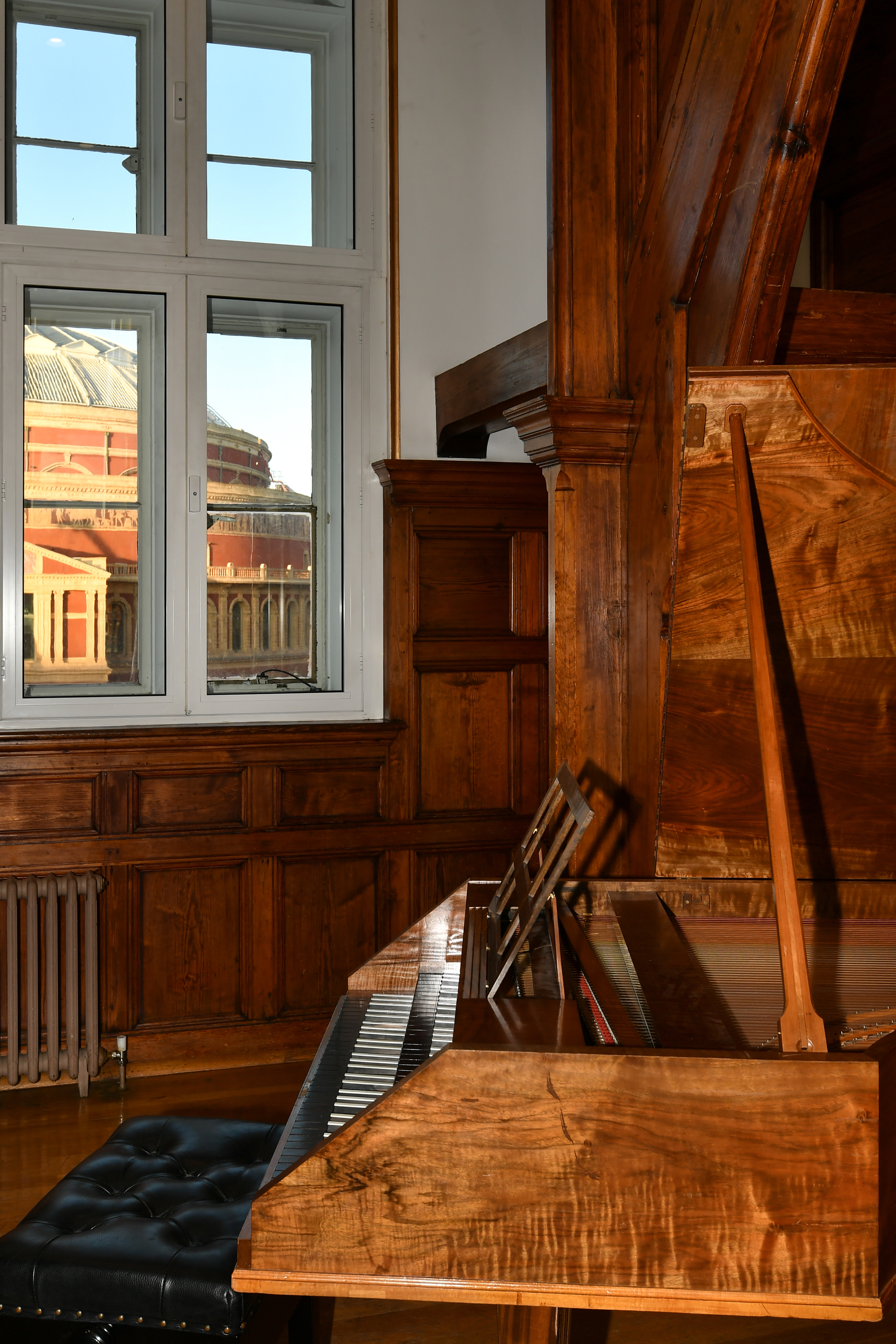 Elegant Parry Rooms interior with wooden paneling, ideal for meetings and events.