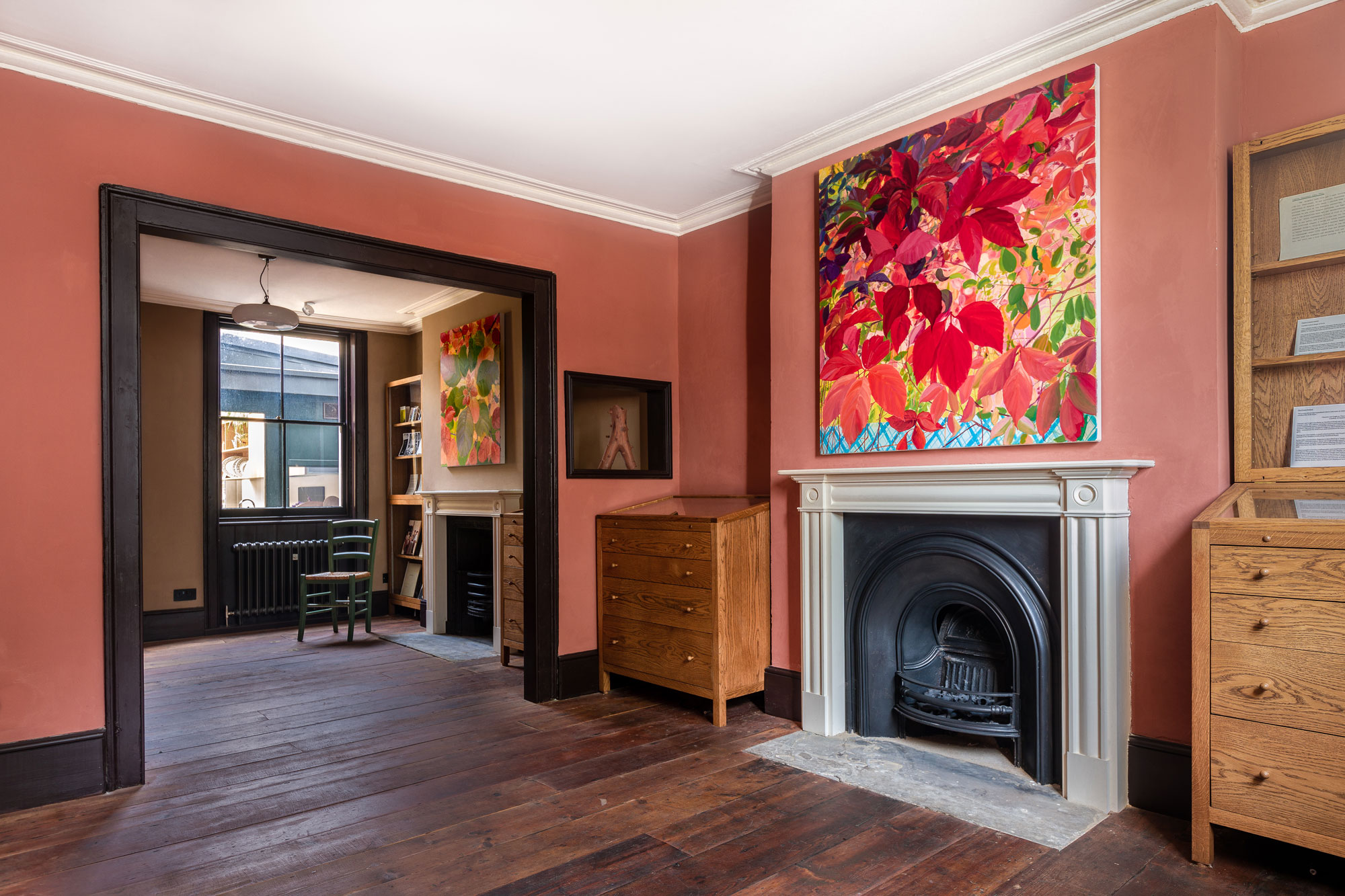 Stylish meeting space with vibrant art in Van Gogh House, perfect for gatherings and brainstorming.